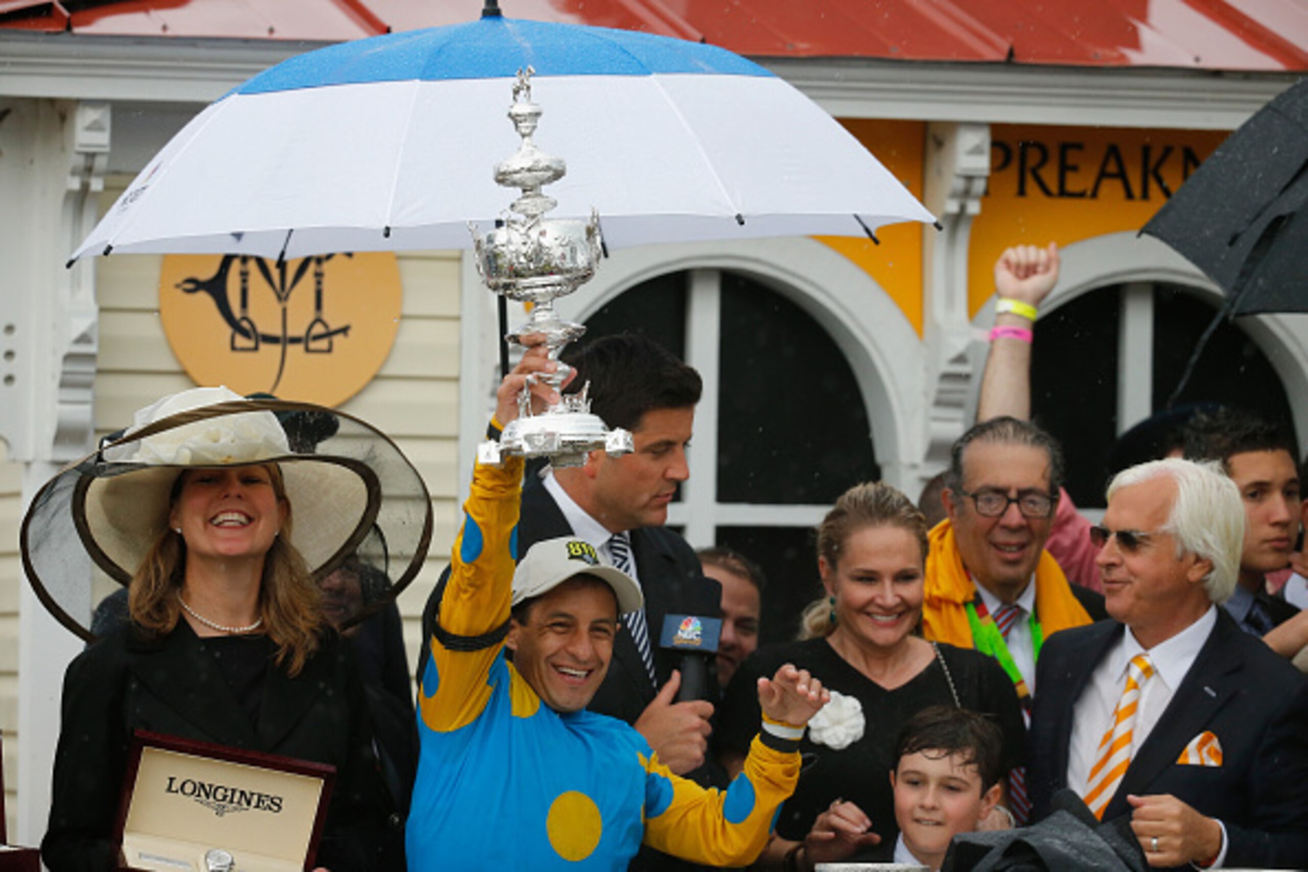 BALTIMORE, MD - MAY 16:  Jockey Victor Espinoza celebrates in the winners circle after riding American Pharoah to victory in the 140th running of the Preakness Stakes at Pimlico Race Course on May 16, 2015 in Baltimore, Maryland.  (Photo by Rob Carr/Getty