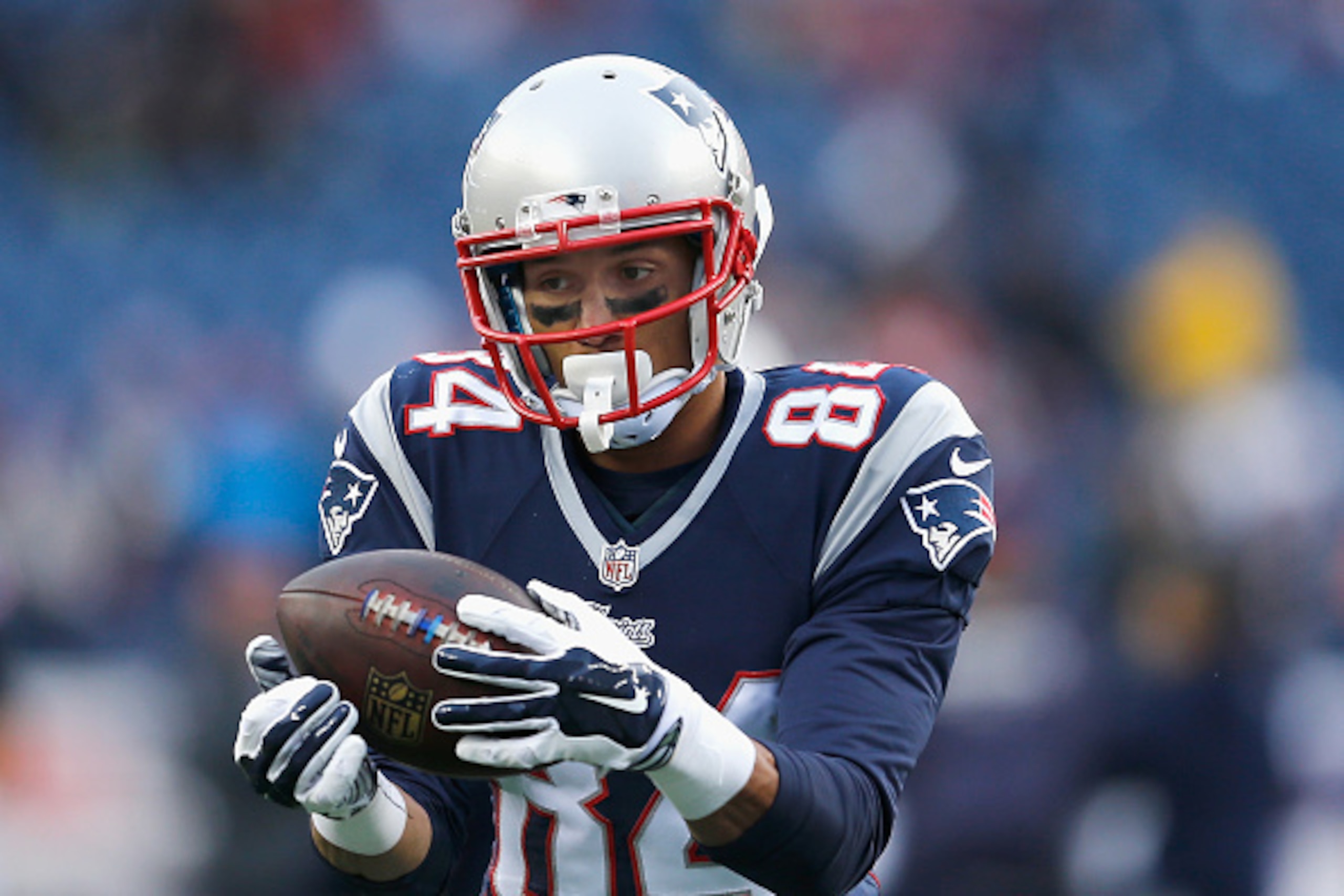 FOXBORO, MA - NOVEMBER 02:  Brian Tyms #84 of the New England Patriots warms up before a game against the Denver Broncos at Gillette Stadium on November 2, 2014 in Foxboro, Massachusetts.  (Photo by Jim Rogash/Getty Images)