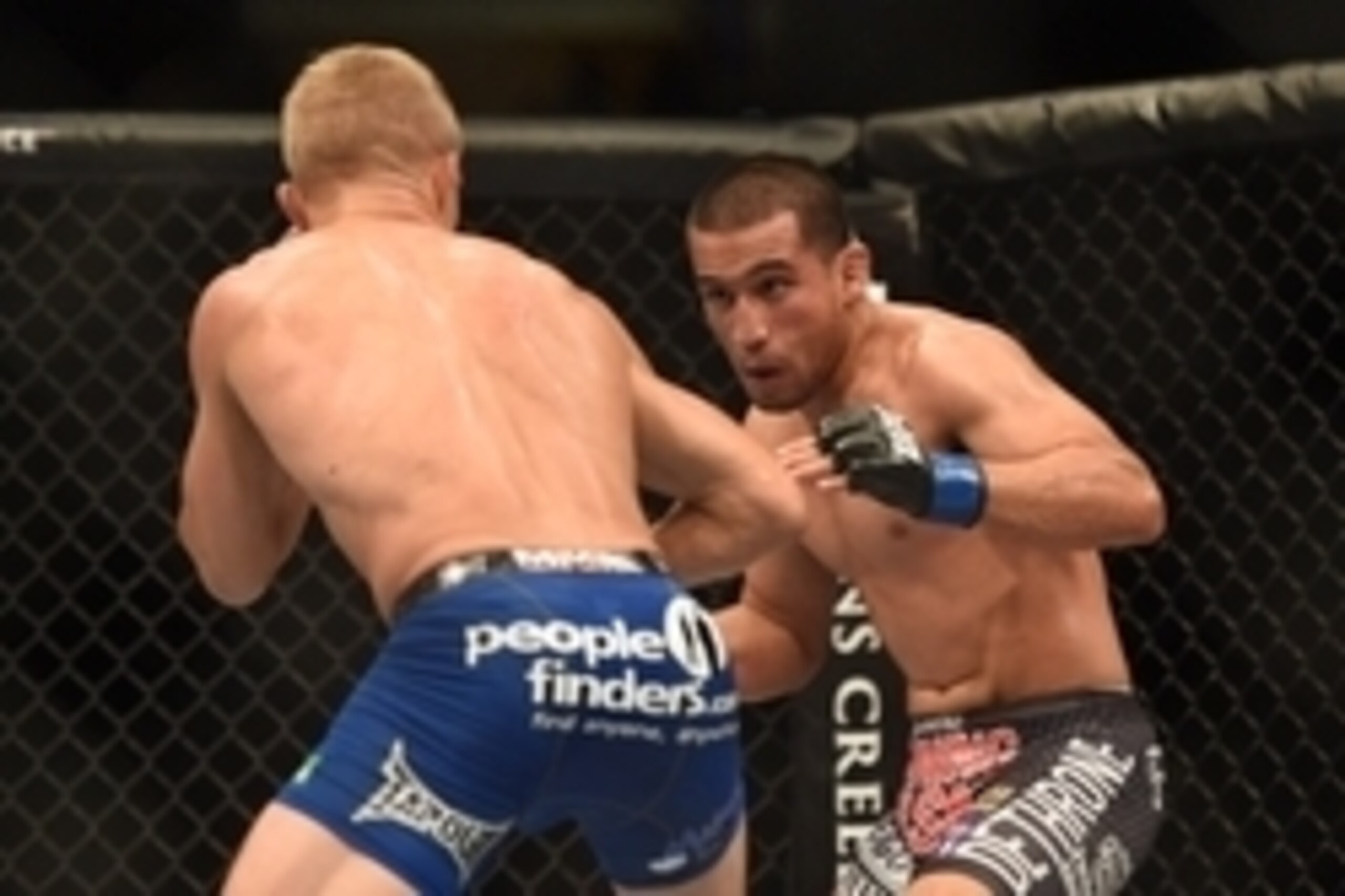 August 30, 2014; Sacramento, CA, USA; Joe Soto (blue gloves) fights against T.J. Dillashaw (red gloves) during the bantamweight title bout of UFC 177 at Sleep Train Arena. Mandatory Credit: Kyle Terada-USA TODAY Sports