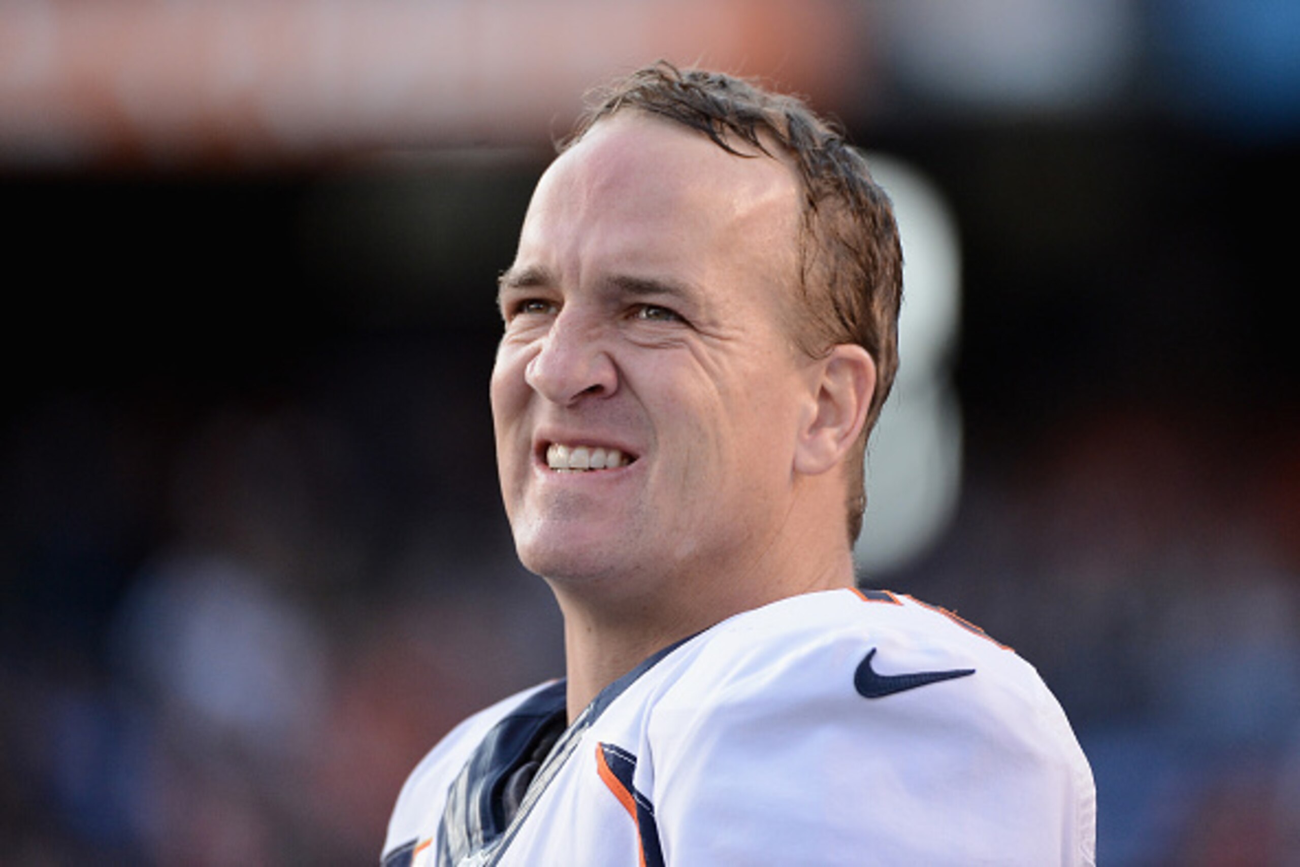 SAN DIEGO, CA - DECEMBER 14:  Quarterback Peyton Manning #18 of the Denver Broncos stands on the sidelines during a game against the San Diego Chargers at Qualcomm Stadium on December 14, 2014 in San Diego, California.  (Photo by Donald Miralle/Getty Imag