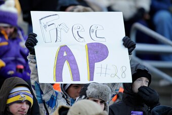 MINNEAPOLIS, MN - NOVEMBER 30: A fan holds up a sign in support of Adrian Peterson #28 of the Minnesota Vikings during the third quarter of the game against the Carolina Panthers on November 30, 2014 at TCF Bank Stadium in Minneapolis, Minnesota. The Viki