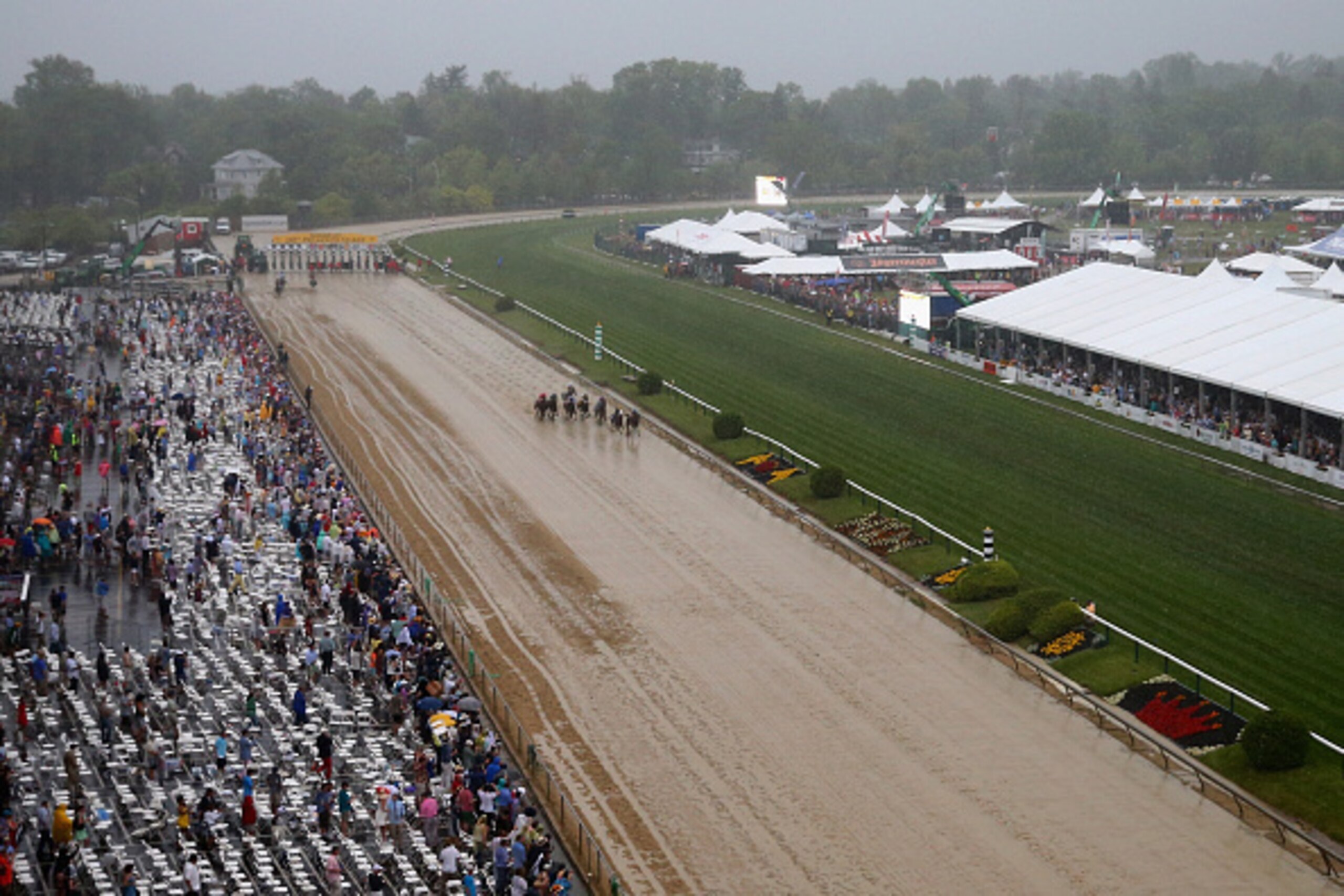 BALTIMORE, MD - MAY 16:  The field heads into the first turn during the 140th running of the Preakness Stakes at Pimlico Race Course on May 16, 2015 in Baltimore, Maryland.  (Photo by Maddie Meyer/Getty Images)