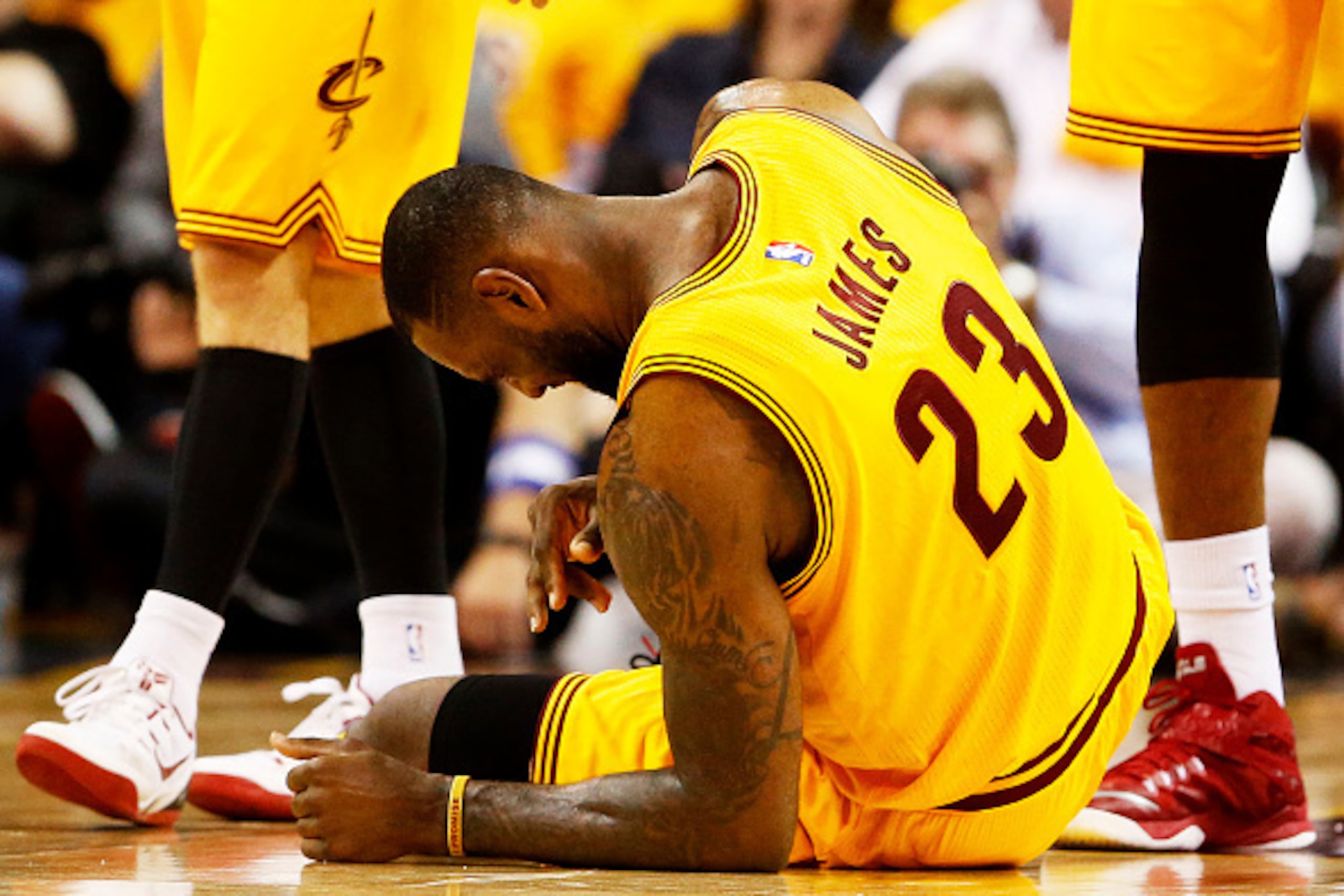 CLEVELAND, OH - MAY 24:  LeBron James #23 of the Cleveland Cavaliers gets up from the court in the third quarter against the Atlanta Hawks during Game Three of the Eastern Conference Finals of the 2015 NBA Playoffs at Quicken Loans Arena on May 24, 2015 i