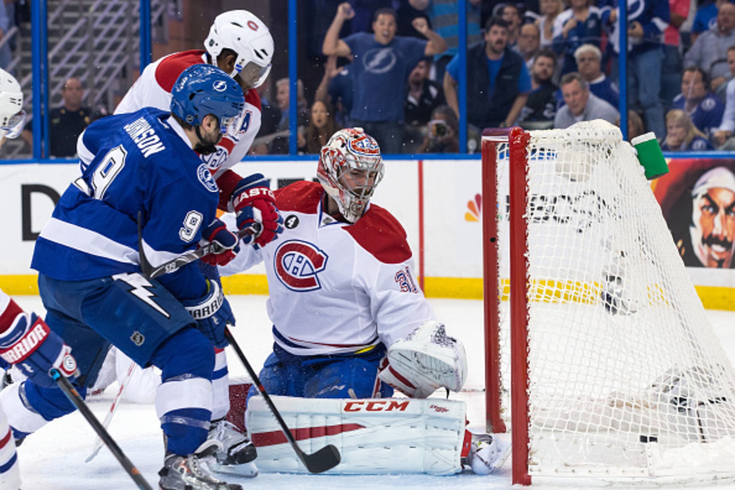 TAMPA, FL - May 6: Tyler Johnson #9 of the Tampa Bay Lightning shoots the puck into the net of goalie Carey Price #31 the Montreal Canadiens for the game winning goal during the third period in Game Three of the Eastern Conference Semifinals during the 20