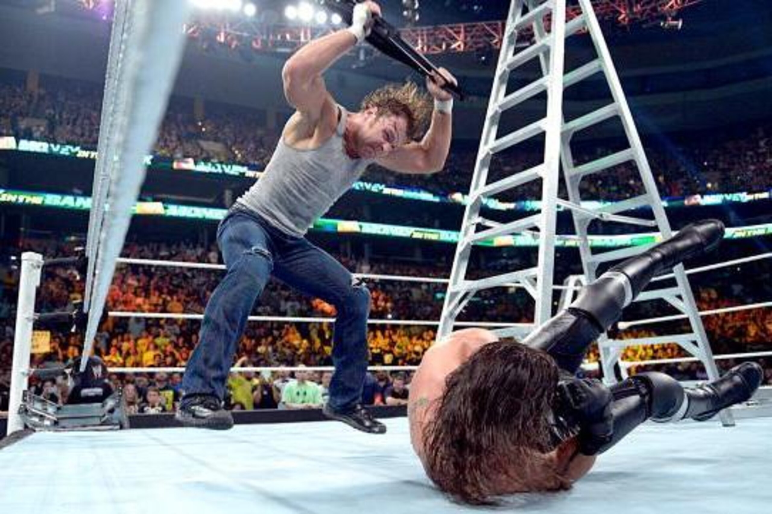 Dean Ambrose attacks Seth Rollins at Money in the Bank 2014.