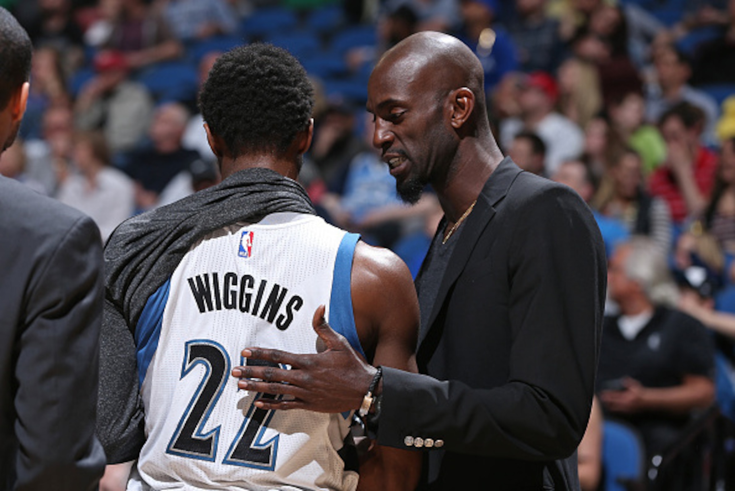 MINNEAPOLIS, MN - APRIL 13:  Kevin Garnett #21 talks with teammate Andrew Wiggins #22 of the Minnesota Timberwolves during the game against the New Orleans Pelicans on April 13, 2015 at Target Center in Minneapolis, Minnesota. NOTE TO USER: User expressly