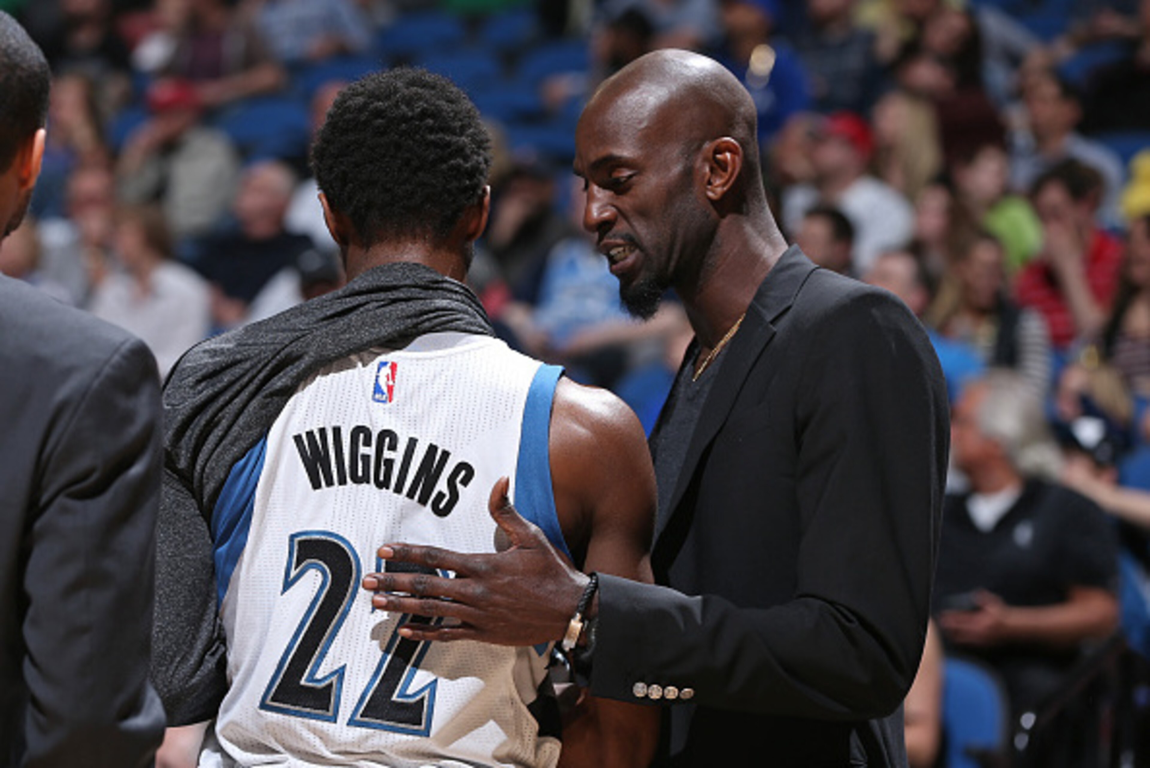 MINNEAPOLIS, MN - APRIL 13:  Kevin Garnett #21 talks with teammate Andrew Wiggins #22 of the Minnesota Timberwolves during the game against the New Orleans Pelicans on April 13, 2015 at Target Center in Minneapolis, Minnesota. NOTE TO USER: User expressly