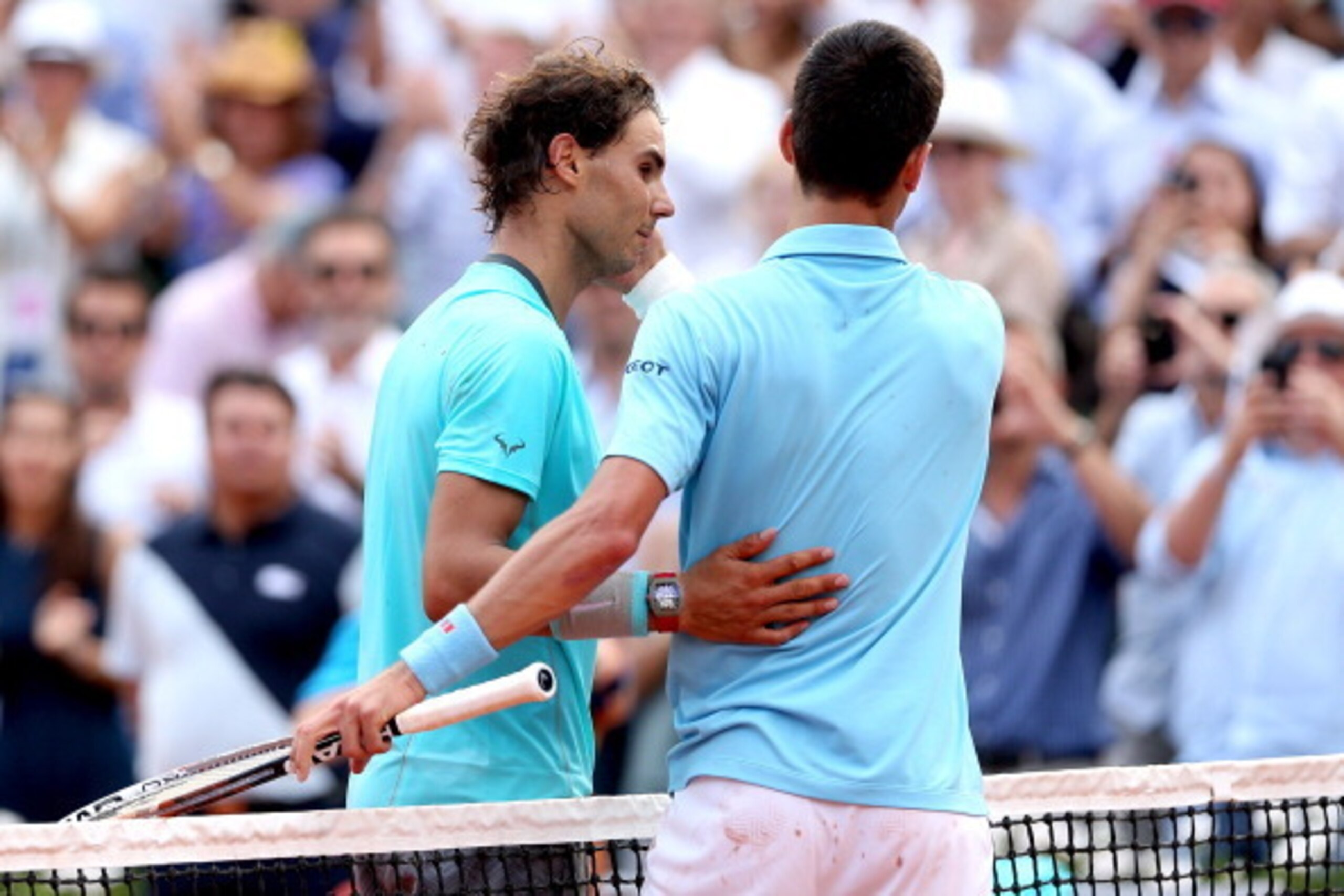 PARIS, FRANCE - JUNE 08: Rafael Nadal of Spain shakes hands with Novak Djokovic of Serbia after their men's singles final match on day fifteen of the French Open at Roland Garros on June 8, 2014 in Paris, France. (Photo by Matthew Stockman/Getty Images) PARIS, FRANCE - JUNE 08: Rafael Nadal of Spain shakes hands with Novak Djokovic of Serbia after their men's singles final match on day fifteen of the French Open at Roland Garros on June 8, 2014 in Paris, France. (Photo by Matthew Stockman/Getty Images)