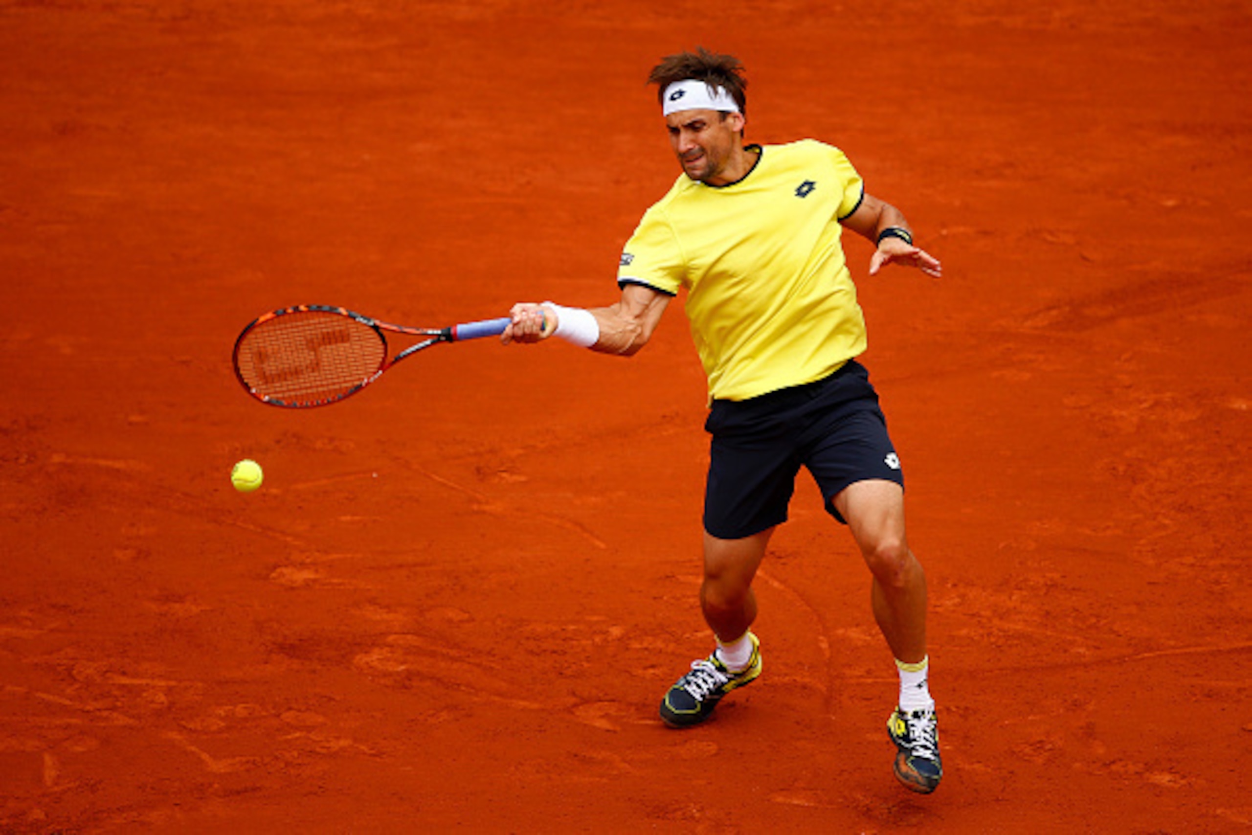 PARIS, FRANCE - MAY 26: David Ferrer of Spain plays a forehand during his Men's Singles match against David Ferrer of Spain on day three of the 2015 French Open at Roland Garros on May 26, 2015 in Paris, France. (Photo by Julian Finney/Getty Images) PARIS, FRANCE - MAY 26: David Ferrer of Spain plays a forehand during his Men's Singles match against David Ferrer of Spain on day three of the 2015 French Open at Roland Garros on May 26, 2015 in Paris, France. (Photo by Julian Finney/Getty Images)