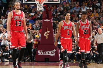 CLEVELAND, OH - MAY 12: Joakim Noah #13 Derrick Rose #1 and Jimmy Butler #21 of the Chicago Bulls during the game against the Cleveland Cavaliers in Game Five of the Eastern Conference Semifinals of the NBA Playoffs at The Quicken Loans Arena on May 12, 2