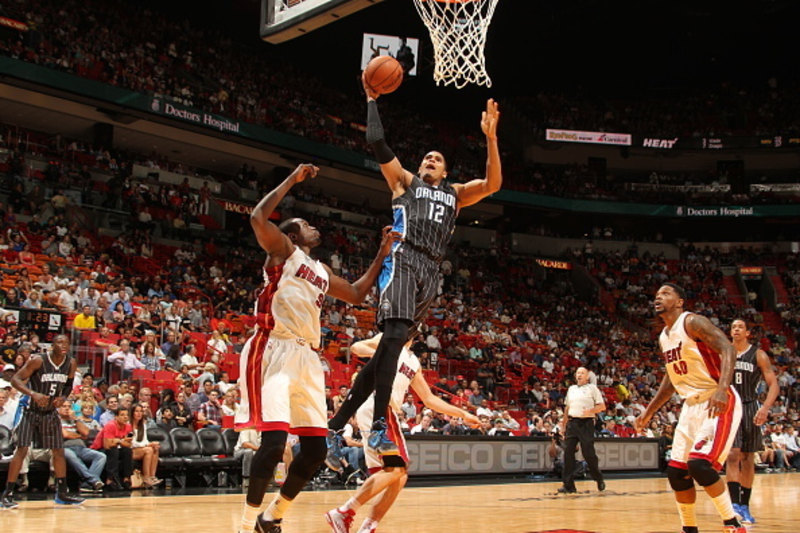 MIAMI, FL - APRIL 13:  Tobias Harris #12 of the Orlando Magic goes to the basket against the Miami Heat on April 13, 2015 at American Airlines Arena in Miami, Florida.  NOTE TO USER: User expressly acknowledges and agrees that, by downloading and or using