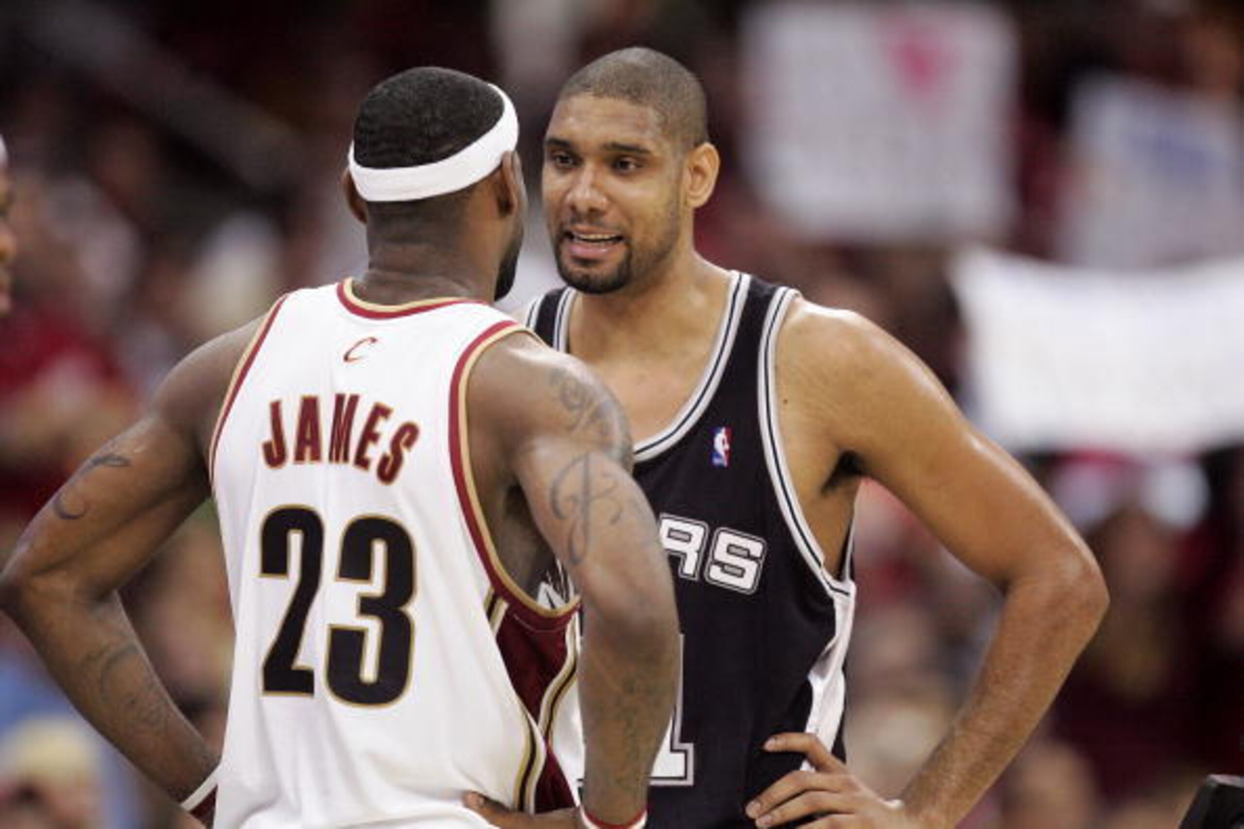 CLEVELAND - JUNE 14:  LeBron James #23 of the Cleveland Cavaliers talks with Tim Duncan #21 of the San Antonio Spurs in Game Four of the NBA Finals at the Quicken Loans Arena on June 14, 2007 in Cleveland, Ohio. NOTE TO USER: User expressly acknowledges a