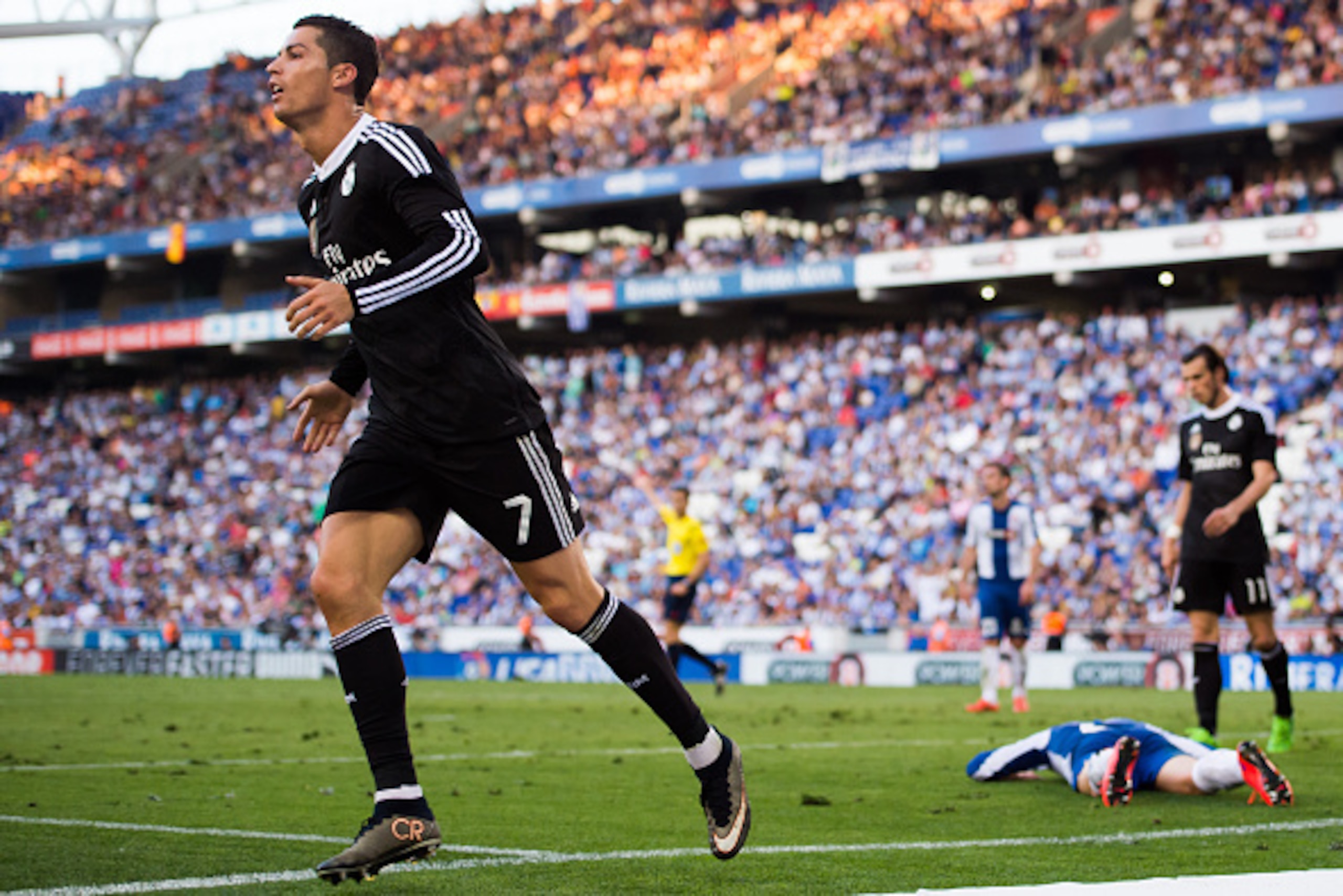 BARCELONA, SPAIN - MAY 17:  Cristiano Ronaldo of Real Madrid CF celebrates after scoring his team's fourth goal during the La Liga match between RCD Espanyol and Real Madrid CF at Cornella-El Prat Stadium on May 17, 2015 in Barcelona, Spain.  (Photo by Al