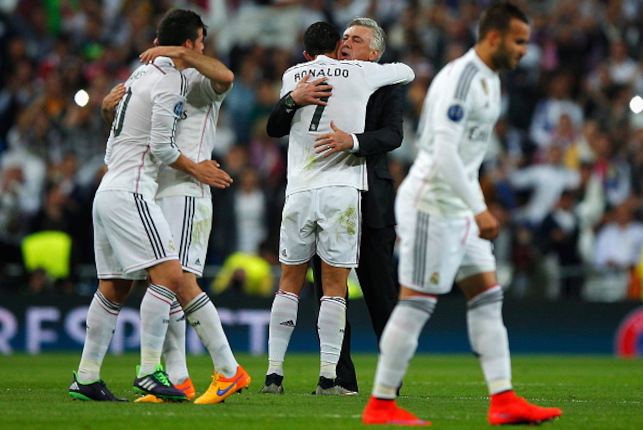 MADRID, SPAIN - APRIL 22: Cristiano Ronaldo of Real Madrid CF celebrates victory with Carlo Ancelotti head coach of Real Madrid CF after the UEFA Champions League quarter-final second leg match between Real Madrid CF and Club Atletico de Madrid at Bernab MADRID, SPAIN - APRIL 22: Cristiano Ronaldo of Real Madrid CF celebrates victory with Carlo Ancelotti head coach of Real Madrid CF after the UEFA Champions League quarter-final second leg match between Real Madrid CF and Club Atletico de Madrid at Bernab