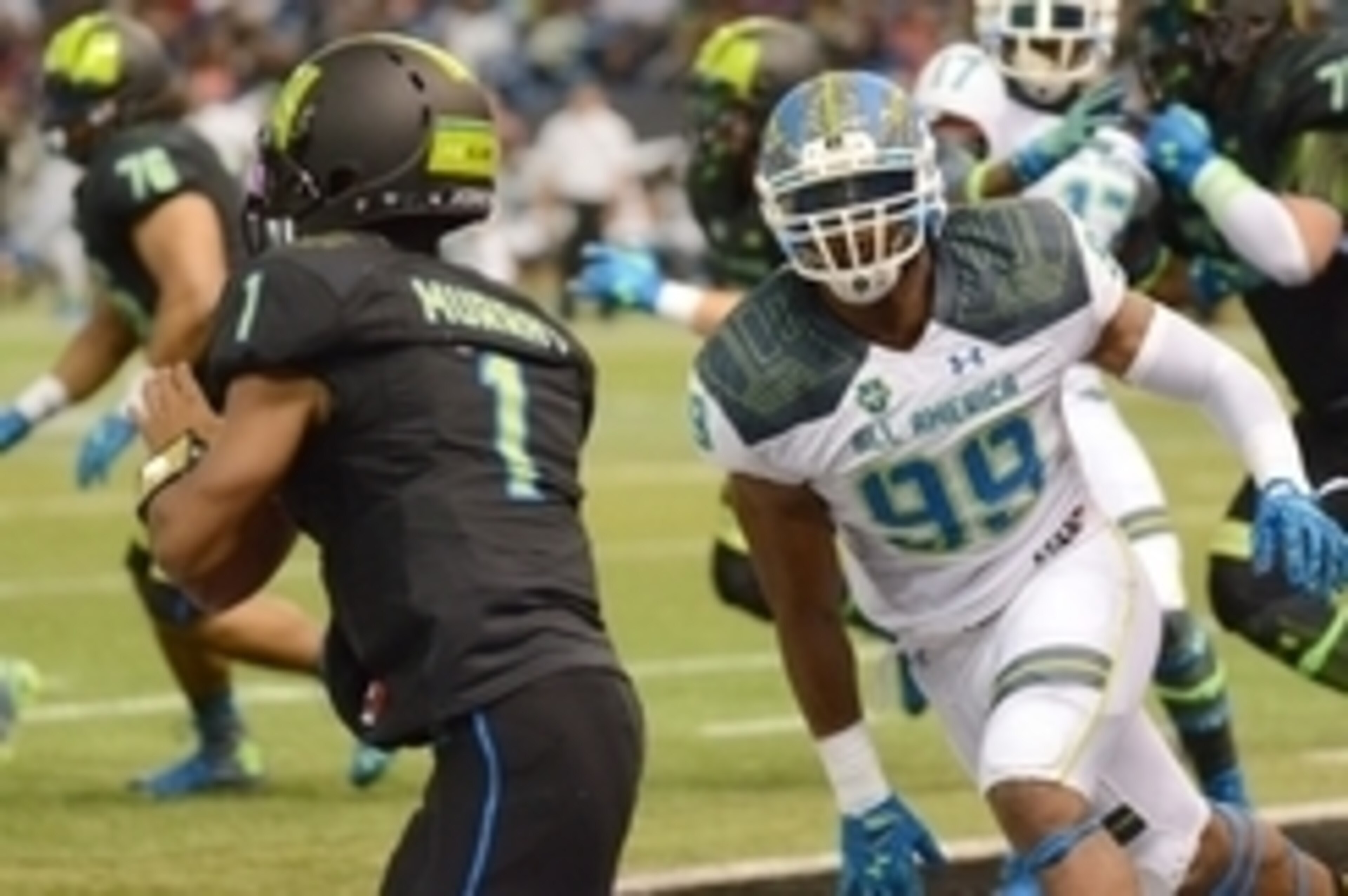 Jan 2, 2015; St. Petersburg, FL, USA; Team Highlight defensive end Byron Cowart (99) rushes Team Armour quarterback Kyler Murray (1) during the first half of the 2015 Under Armour All-America Game at Tropicana Field. Team Highlight defeated Team Armour 46