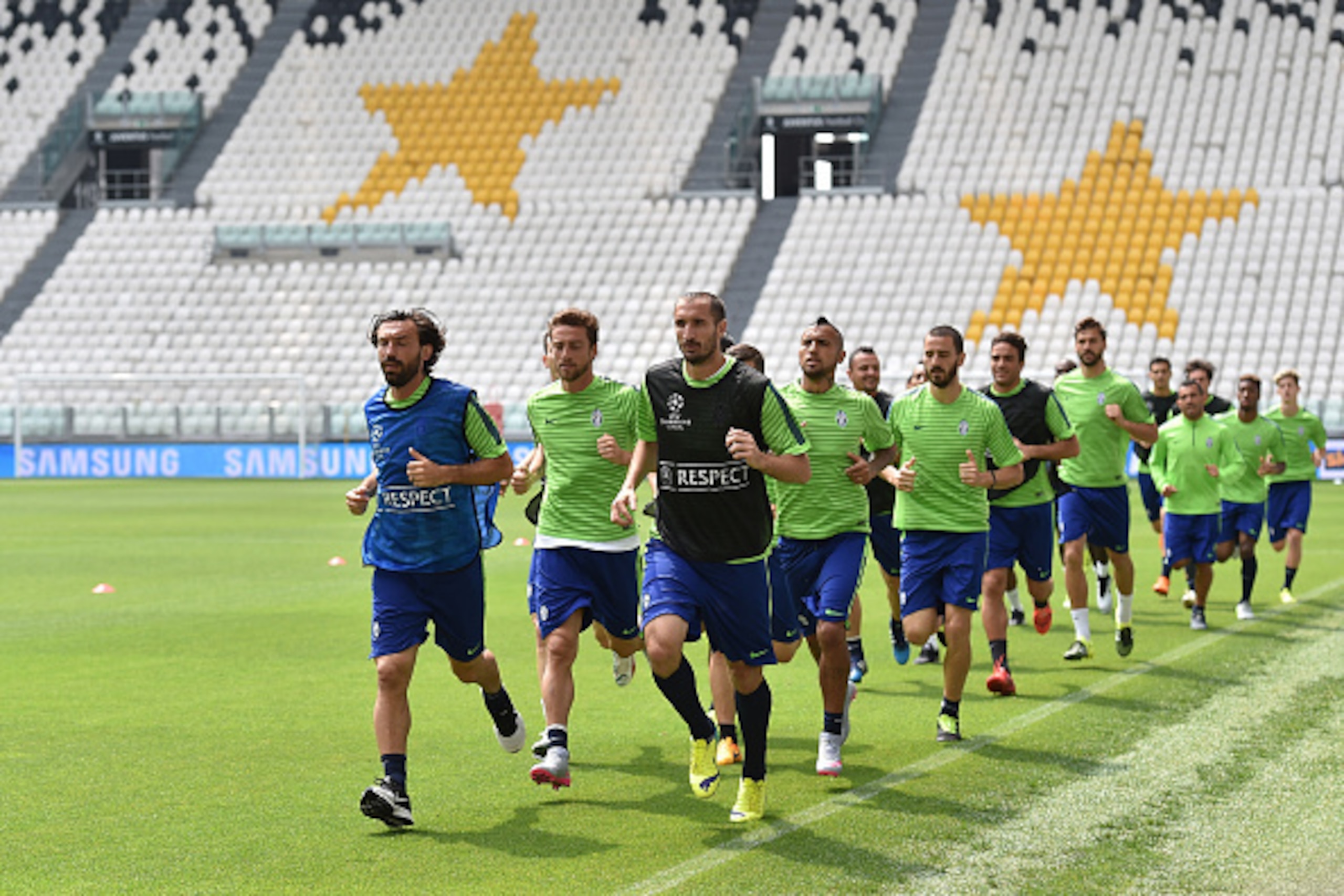 TURIN, ITALY - JUNE 01: AAndrea Pirlo of Juventus FC and his team-mates warm up during the Juventus Media Day at Juventus Arena on June 1, 2015 in Turin, Italy. (Photo by Valerio Pennicino/Getty Images) TURIN, ITALY - JUNE 01: AAndrea Pirlo of Juventus FC and his team-mates warm up during the Juventus Media Day at Juventus Arena on June 1, 2015 in Turin, Italy. (Photo by Valerio Pennicino/Getty Images)