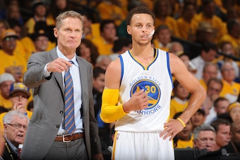 OAKLAND, CA - MAY 27: Steve Kerr and Stephen Curry #30 of the Golden State Warriors speak during a game against the Houston Rockets in Game Five of the Western Conference Finals of the 2015 NBA Playoffs on May 27, 2015 at Oracle Arena in Oakland, Californ OAKLAND, CA - MAY 27: Steve Kerr and Stephen Curry #30 of the Golden State Warriors speak during a game against the Houston Rockets in Game Five of the Western Conference Finals of the 2015 NBA Playoffs on May 27, 2015 at Oracle Arena in Oakland, Californ