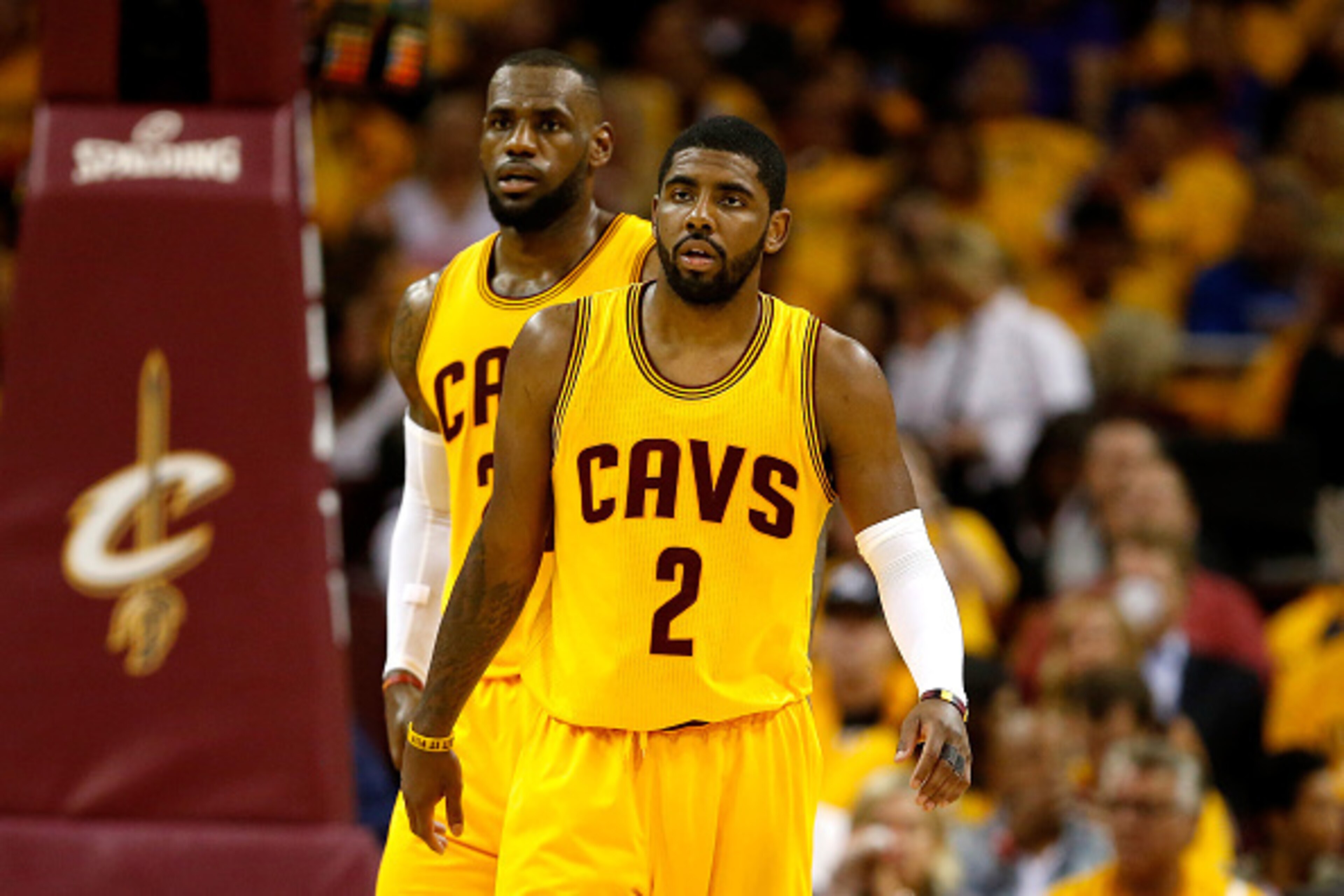 CLEVELAND, OH - MAY 26: LeBron James #23 and Kyrie Irving #2 of the Cleveland Cavaliers look on in the third quarter against the Atlanta Hawks during Game Four of the Eastern Conference Finals of the 2015 NBA Playoffs at Quicken Loans Arena on May 26, 201