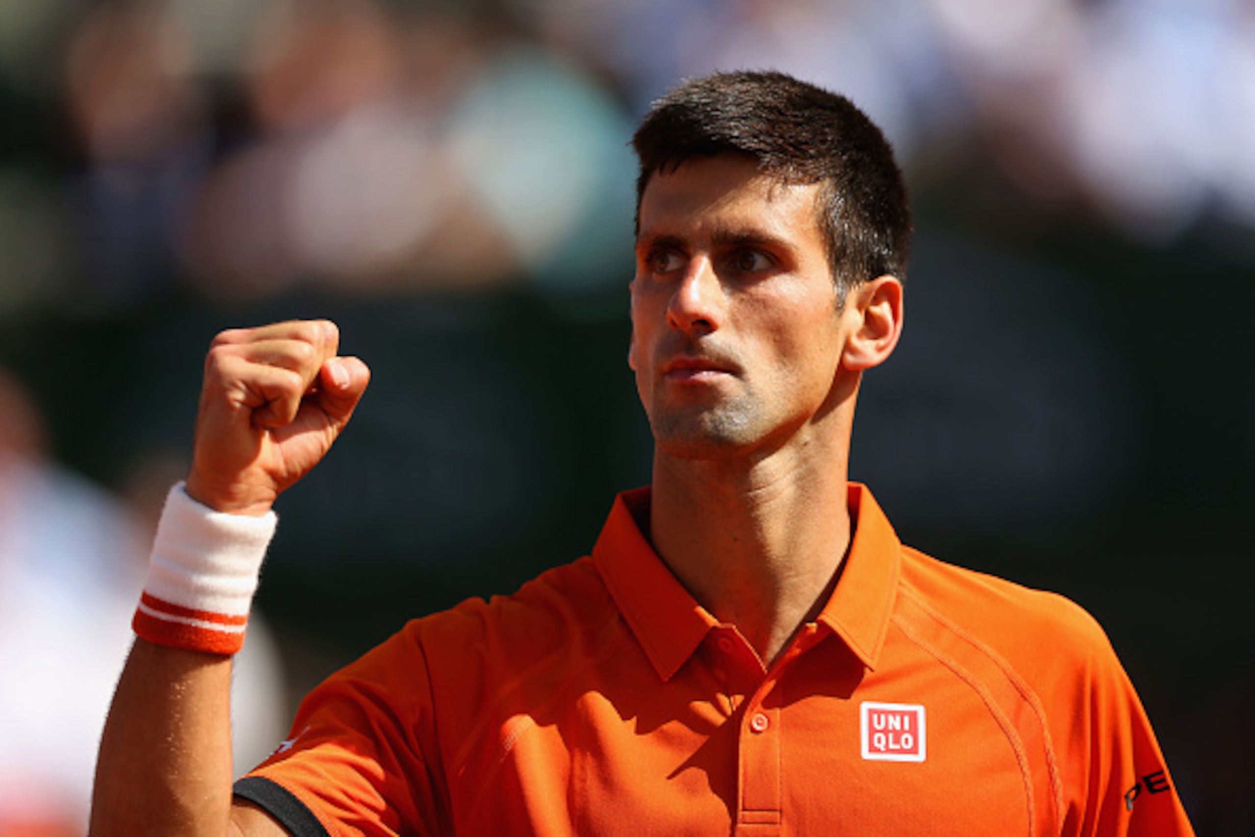 PARIS, FRANCE - JUNE 03:  Novak Djokovic of Serbia celebrates a point in his Men's quarter final match against Rafael Nadal of Spain on day eleven of the 2015 French Open at Roland Garros on June 3, 2015 in Paris, France.  (Photo by Clive Brunskill/Getty 