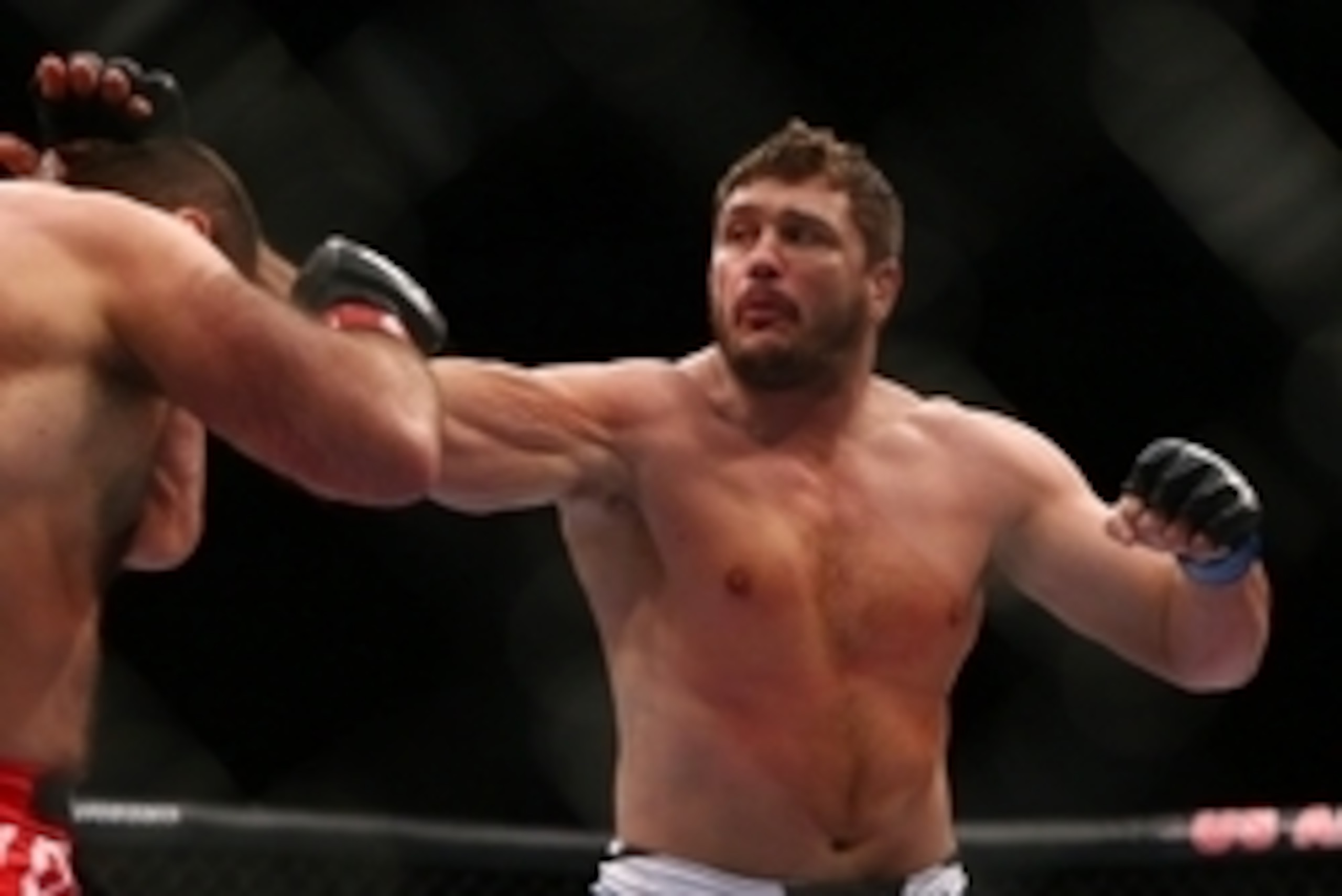 December 13, 2014; Phoenix, AZ, USA; Matt Mitrione hits Gabriel Gonzaga during UFC Fight Night at US Airways Center. Mandatory Credit: Mark J. Rebilas-USA TODAY Sports