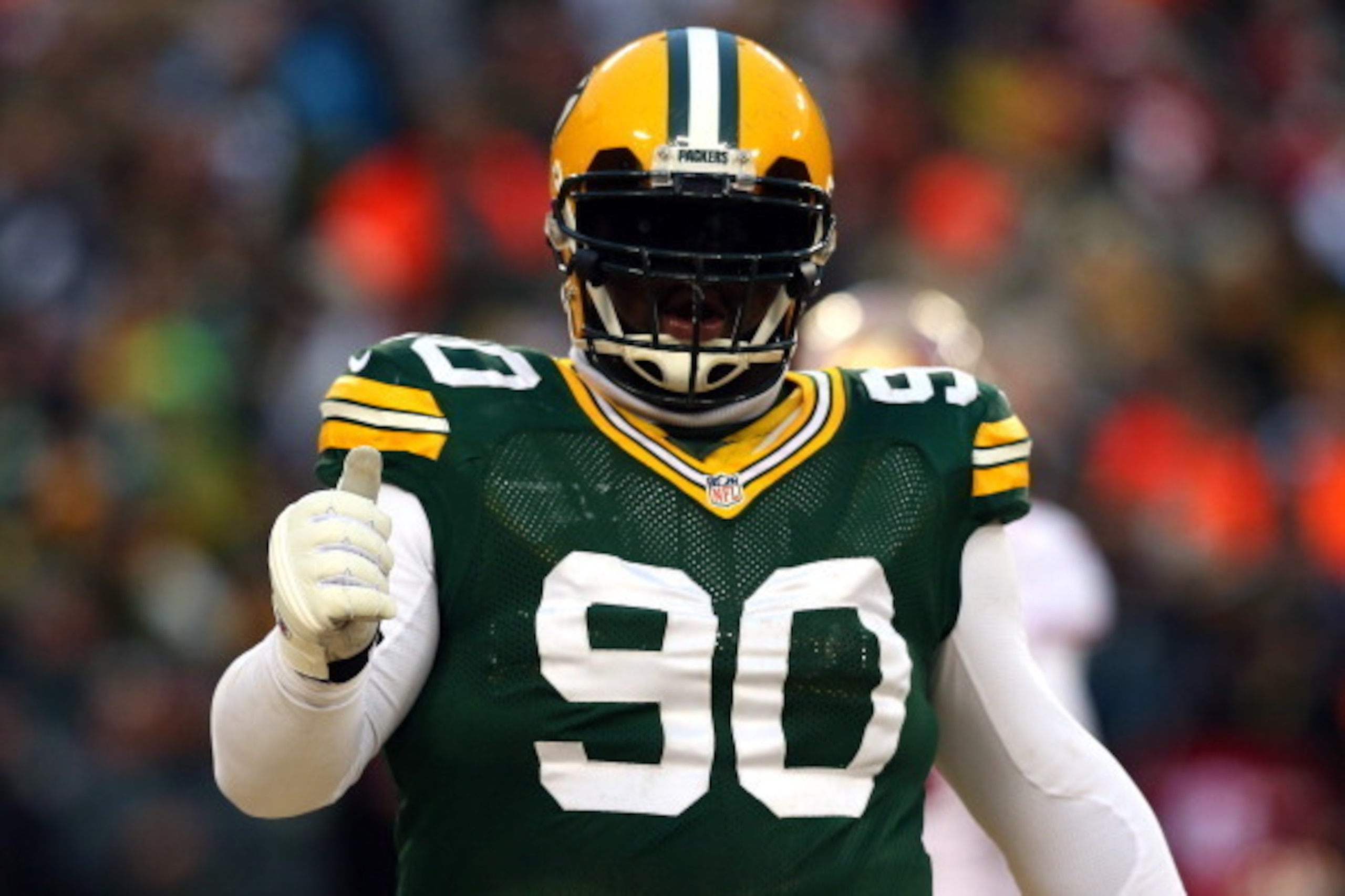 GREEN BAY, WI - JANUARY 05:   B.J. Raji #90 of the Green Bay Packers celebrates a incomplete pass by the San Francisco 49ers in the first quarter during their NFC Wild Card Playoff game at Lambeau Field on January 5, 2014 in Green Bay, Wisconsin.  (Photo 