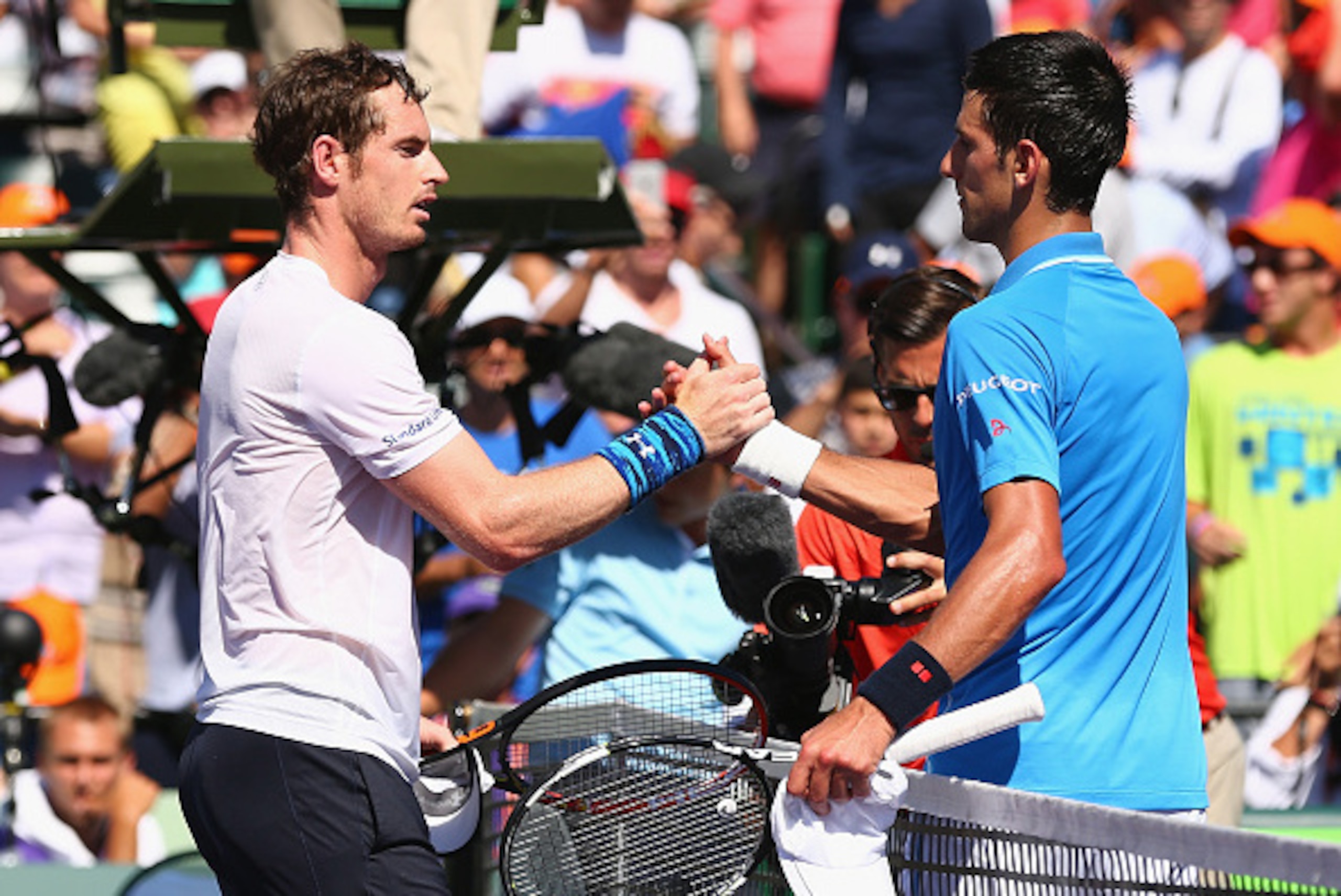 KEY BISCAYNE, FL - APRIL 05: Novak Djokovic of Serbia shakes hands at the net after his three set victory against Andy Murray of Great Britain in the mens final during the Miami Open Presented by Itau at Crandon Park Tennis Center on April 5, 2015 in Key KEY BISCAYNE, FL - APRIL 05: Novak Djokovic of Serbia shakes hands at the net after his three set victory against Andy Murray of Great Britain in the mens final during the Miami Open Presented by Itau at Crandon Park Tennis Center on April 5, 2015 in Key