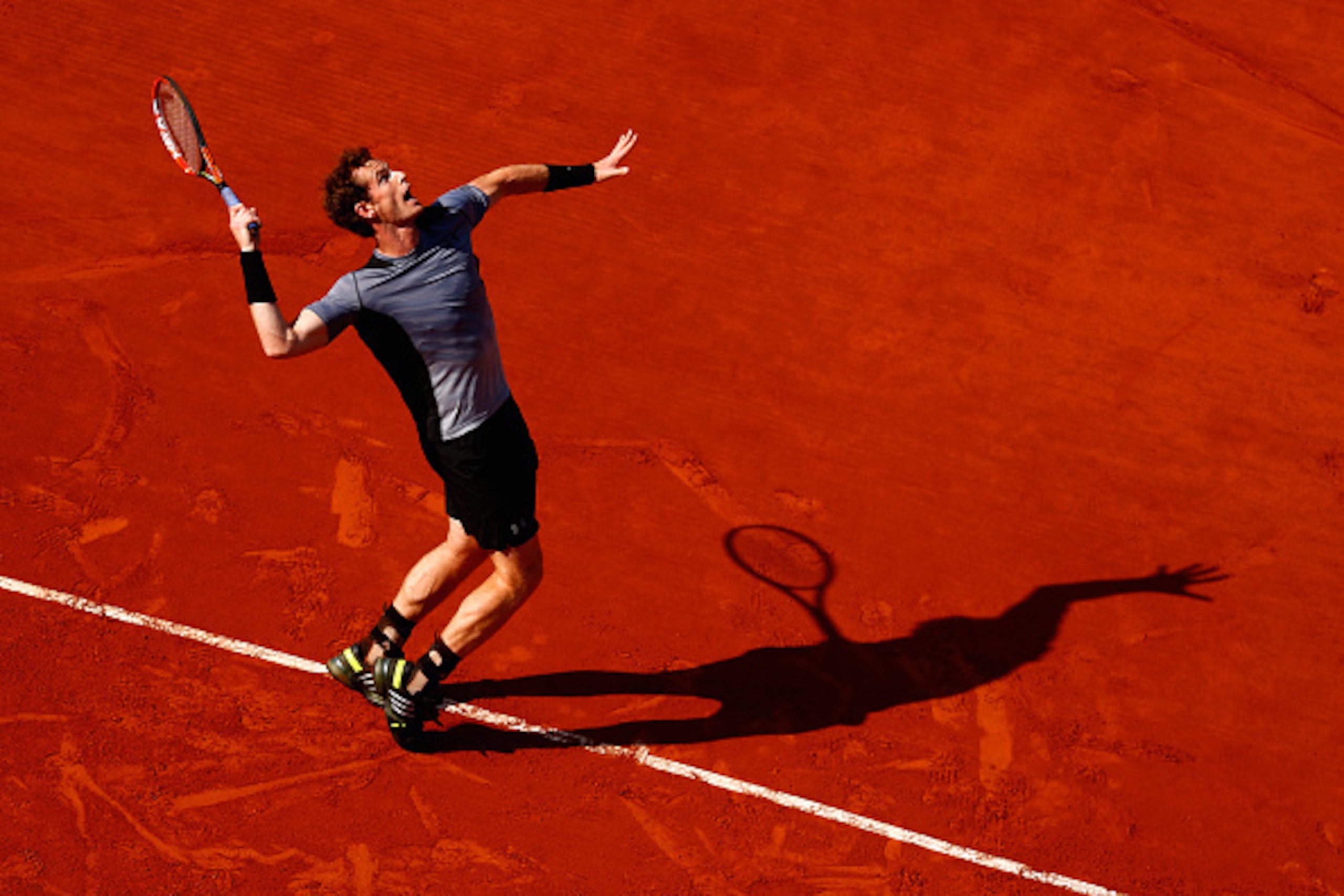 PARIS, FRANCE - JUNE 03: Andy Murray of Great Britain serves in his Men's quarter final match against David Ferrer of Spain on day eleven of the 2015 French Open at Roland Garros on June 3, 2015 in Paris, France. (Photo by Julian Finney/Getty Images) PARIS, FRANCE - JUNE 03: Andy Murray of Great Britain serves in his Men's quarter final match against David Ferrer of Spain on day eleven of the 2015 French Open at Roland Garros on June 3, 2015 in Paris, France. (Photo by Julian Finney/Getty Images)