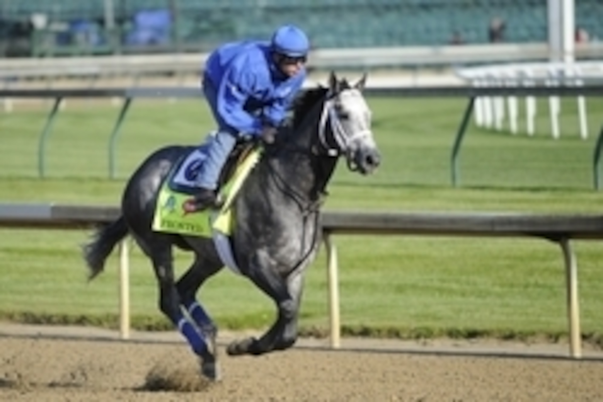 Apr 29, 2015; Louisville, KY, USA; Exercise rider Rob Massey works out Kentucky Derby hopeful Frosted trained by Kiaran McLaughlin at Churchill Downs. Mandatory Credit: Jamie Rhodes-USA TODAY Sports