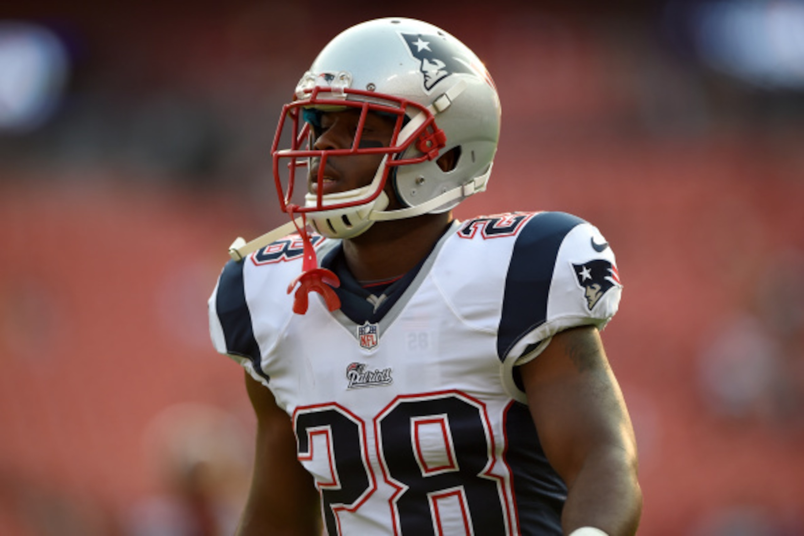 LANDOVER, MD - AUGUST 07: Running back James White #28 of the New England Patriots looks on before playing the Washington Redskins during a preseason NFL game at FedExField on August 7, 2014 in Landover, Maryland. The Washington Redskins won, 23-6. (Photo