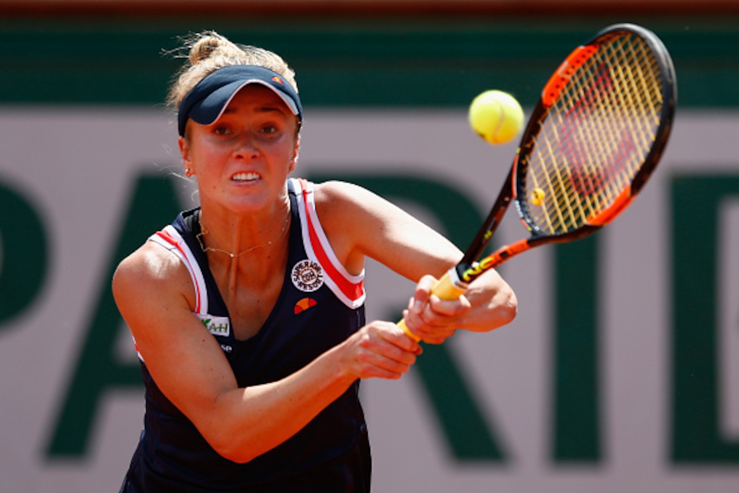 PARIS, FRANCE - JUNE 02:  Elina Svitolina of Ukraine plays a backhand in her Women's quarter final match against Ana Ivanovic of Serbia on day of the 2015 French Open at Roland Garros on June 2, 2015 in Paris, France.  (Photo by Julian Finney/Getty Images