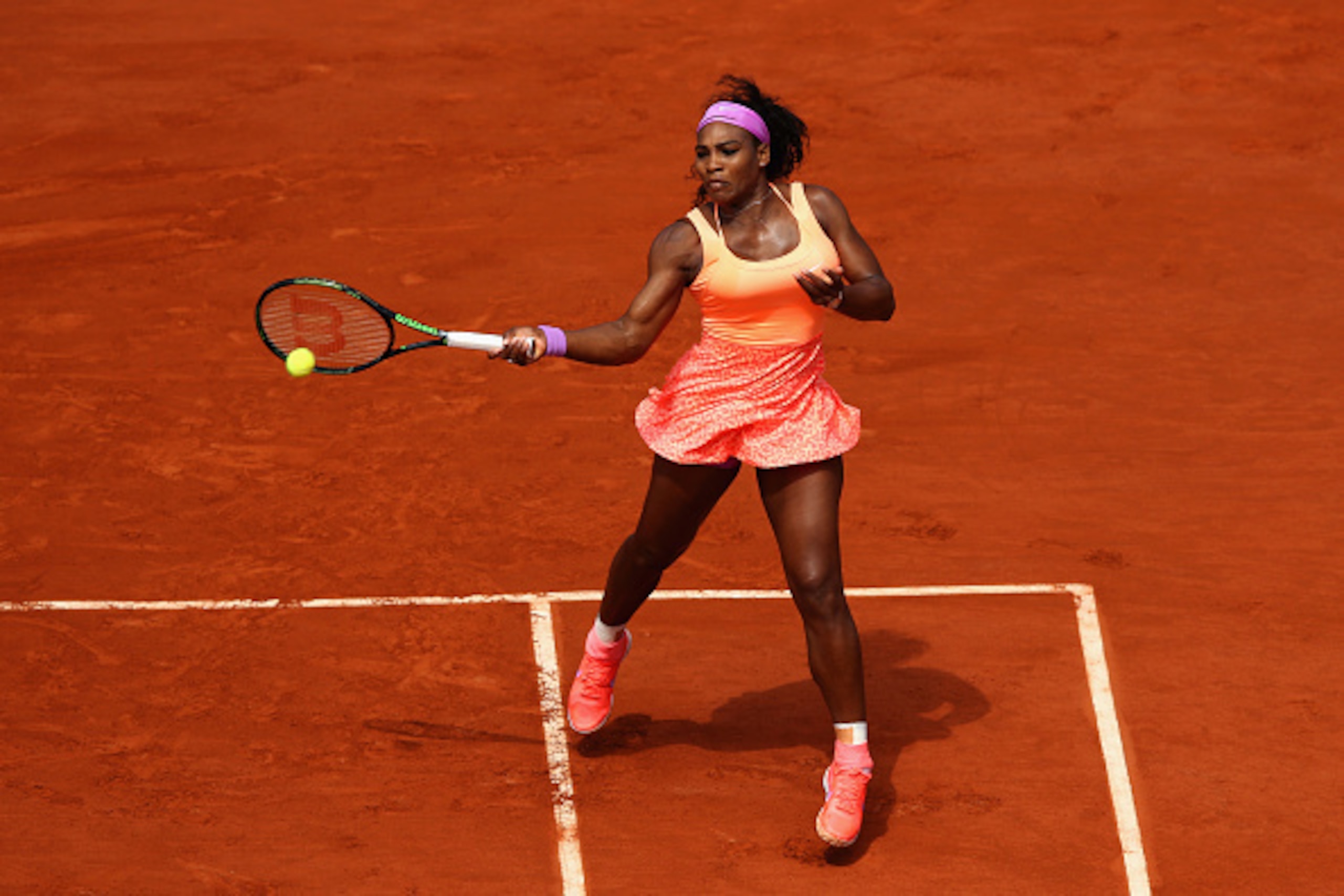 PARIS, FRANCE - JUNE 03:  Serena Williams of the United States returns a shot in her Women's quarter final match against Sara Errani of Italy on day eleven of the 2015 French Open at Roland Garros on June 3, 2015 in Paris, France.  (Photo by Clive Brunski