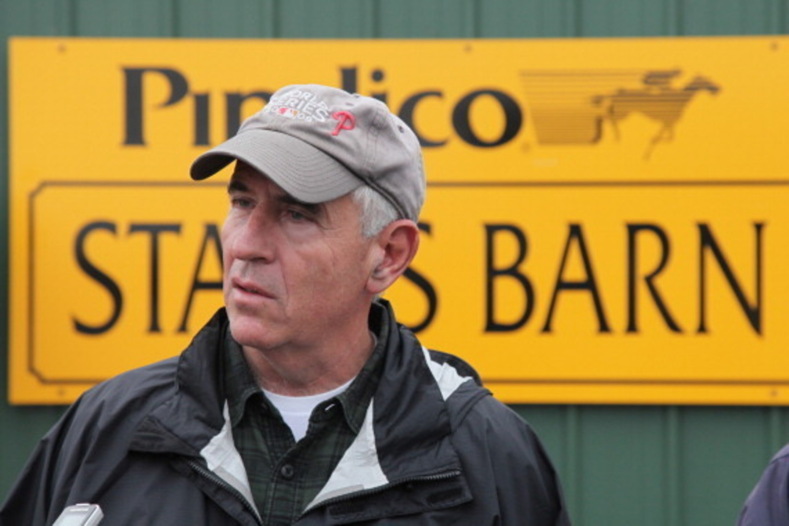 BALTIMORE, MD - MAY 19: Nick Zito, trainer of Preakness entrant Dialed In, talks with the media outside the stakes barn at Pimlico Race Course on May 19, 2011 in Baltimore, Maryland. The 136th running of the Preakness Stakes will be run on Saturday.  (Pho