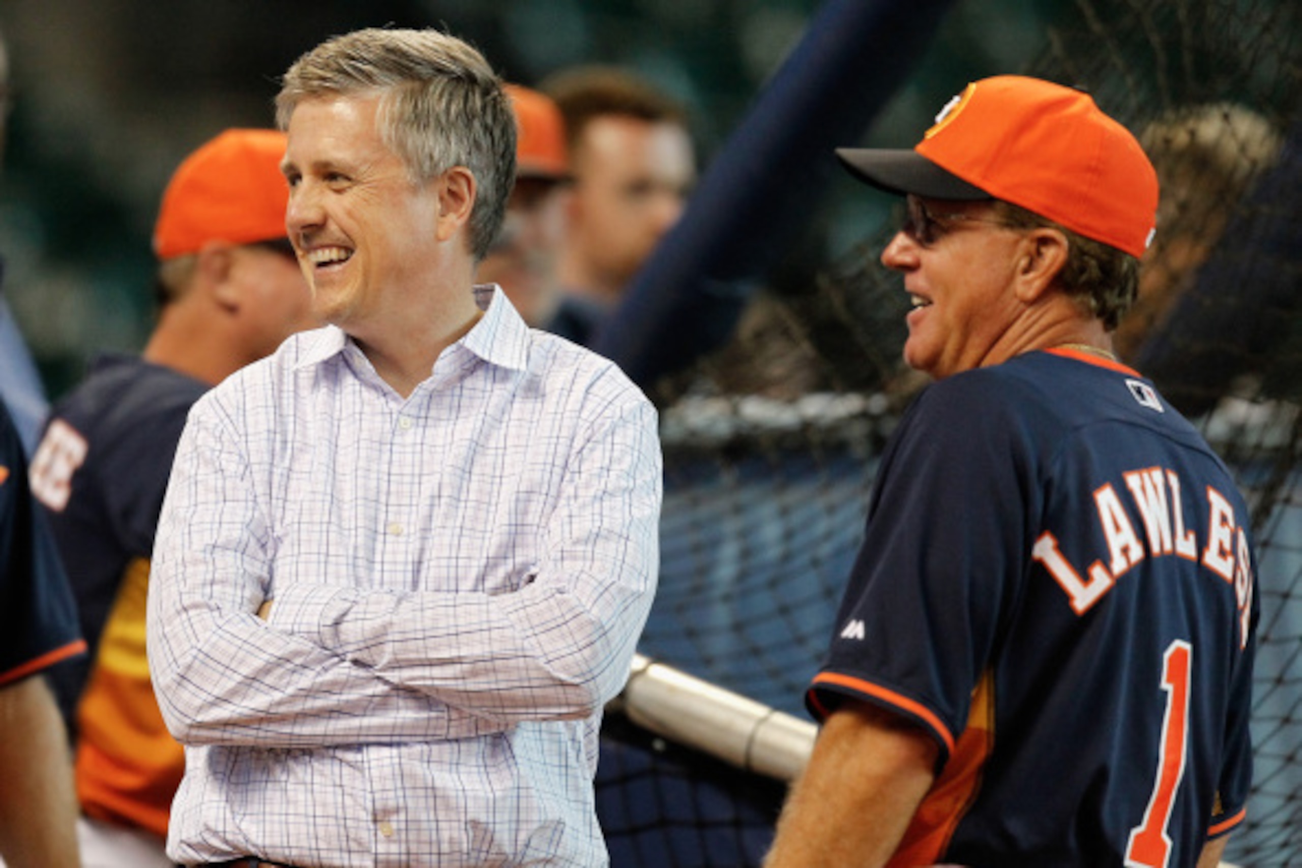 HOUSTON, TX - SEPTEMBER 03:  Houston Astros interim manager Tom Lawless #1 and general manager Jeff Luhnow talk during batting practice at Minute Maid Park on September 3, 2014 in Houston, Texas.  (Photo by Bob Levey/Getty Images)