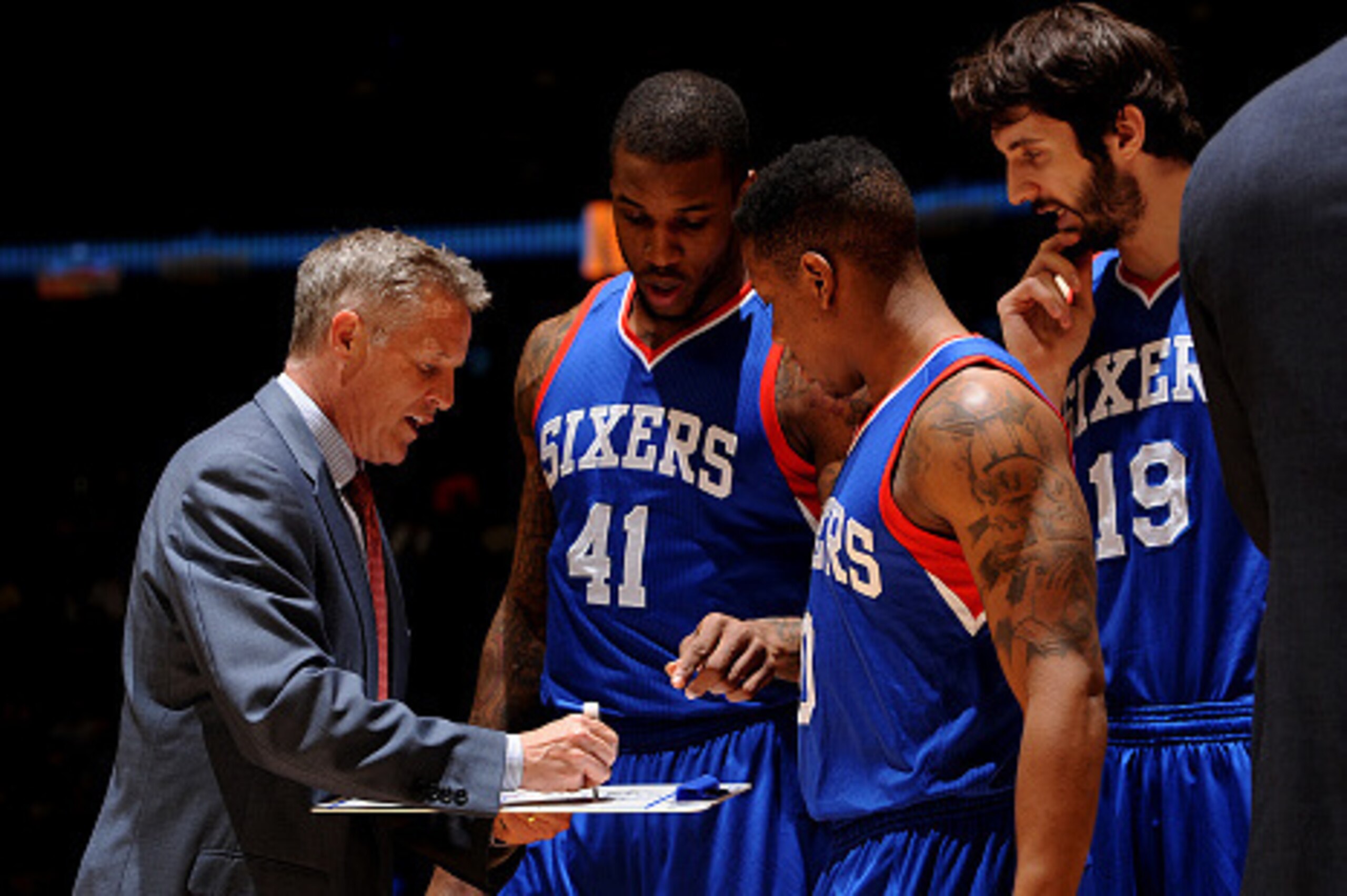 DENVER, CO - March 25: Head coach Brett Brown of the Philadelphia 76ers and his team during the game against the Denver Nuggets on March 25, 2015 at the Pepsi Center in Denver, Colorado. NOTE TO USER: User expressly acknowledges and agrees that, by downlo