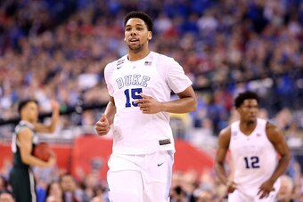 INDIANAPOLIS, IN - APRIL 04: Jahlil Okafor #15 of the Duke Blue Devils reacts after a play in the second half against the Michigan State Spartans during the NCAA Men's Final Four Semifinal at Lucas Oil Stadium on April 4, 2015 in Indianapolis, Indiana.  (