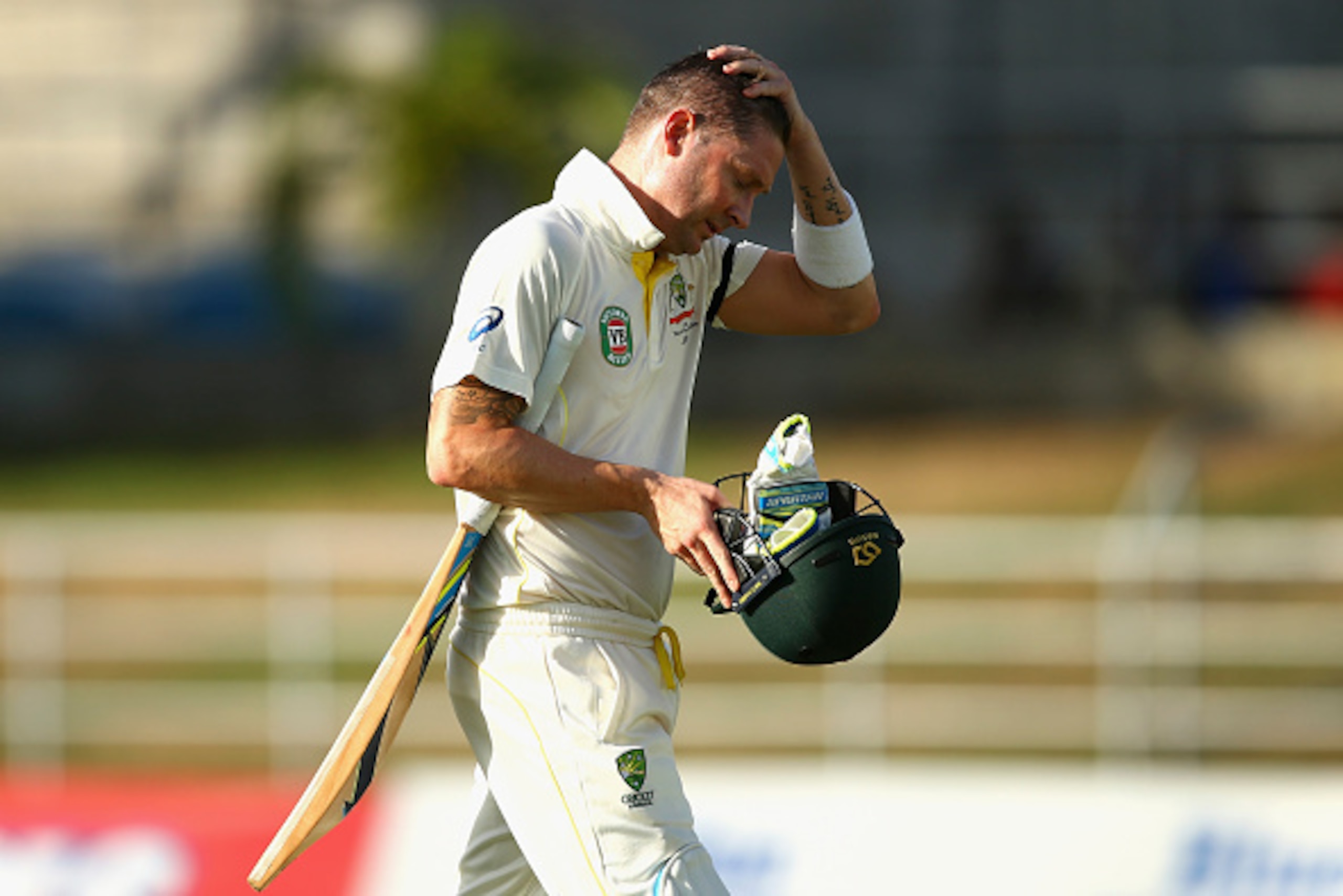 ROSEAU, DOMINICA - JUNE 03:  Michael Clarke of Australia looks dejected after being dismissed by Devendra Bishoo of West Indies during day one of the First Test match between Australia and the West Indies at Windsor Park on June 3, 2015 in Roseau, Dominic