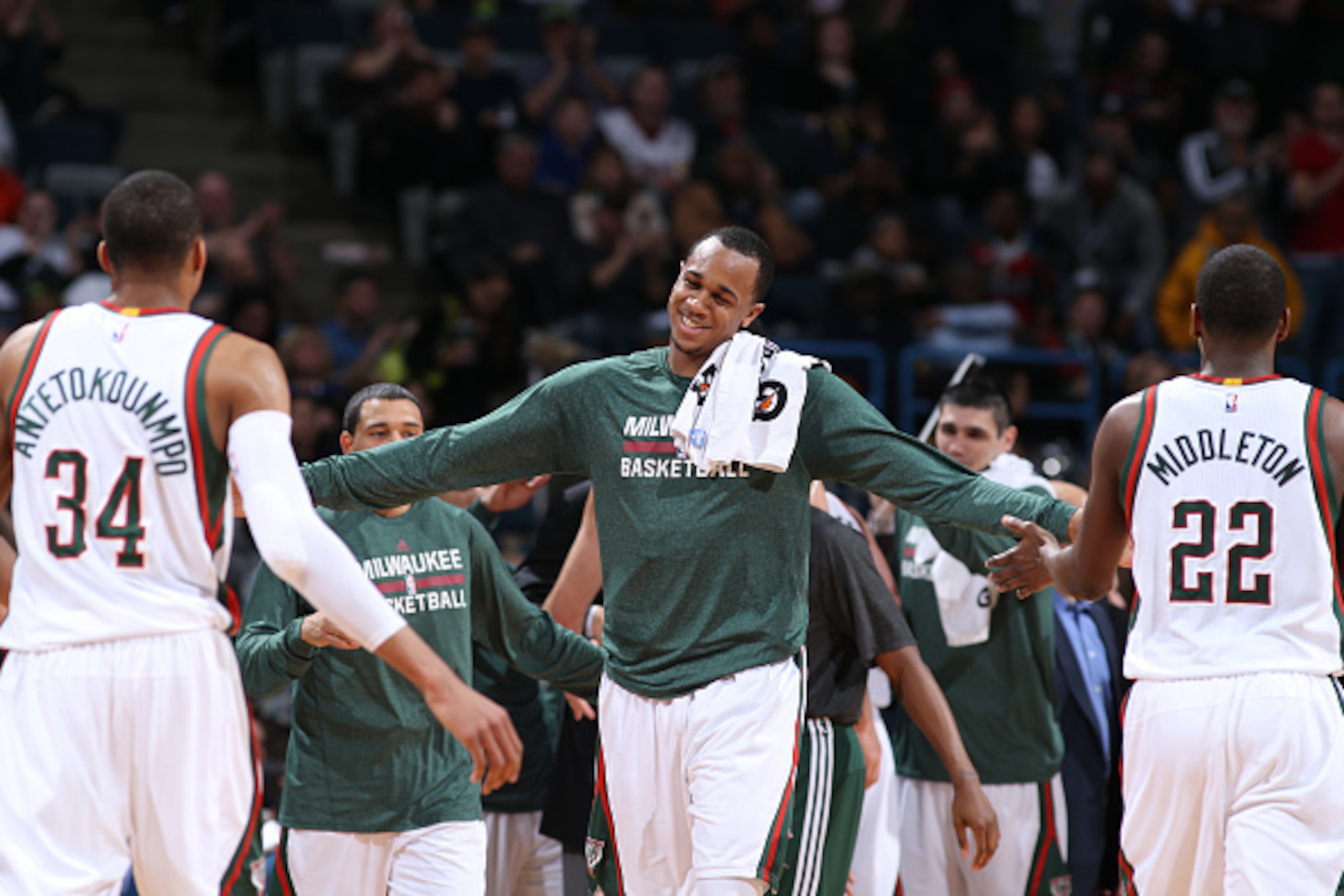 MILWAUKEE, WI - MARCH 24: Giannis Antetokounmpo #34 John Henson #31 and Khris Middleton #22 of the Milwaukee Bucks during the game against the Miami Heat on March 24, 2015 at BMO Harris Bradley Center in Milwaukee, Wisconsin. NOTE TO USER: User expressly 