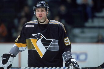 1 Mar 2000:  Aleksey Morozov #95 of the Pittsburgh Penguins looks on the ice during a game against the Calgary Flames at the Canadian Airlines SaddleDome in Calgary, Alberta, Canada. The Flames defeated the Penguins 8-2. Mandatory Credit: Ian Tomlinson  /