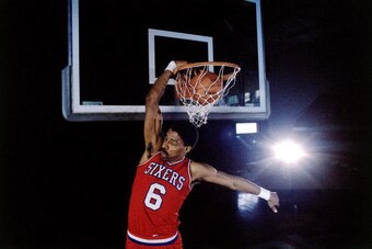 1980:  Julius Erving #6 of the Philadelphia 76ers goes up for a slam dunk in 1980.  NOTE TO USER: User expressly acknowledges  and agrees that, by downloading and or using this  photograph, User is consenting to the terms and conditions of the Getty Image