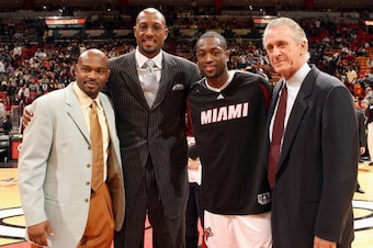 MIAMI - JANUARY 31:  (L-R) Tim Hardaway, Alonzo Mourning, Dwyane Wade #3 and Pat Riley of the Miami Heat pose for a portrait during the halftime ceremony honoring gold medalists Wade, Hardaway and Mourning during the game against the Dallas Mavericks on J