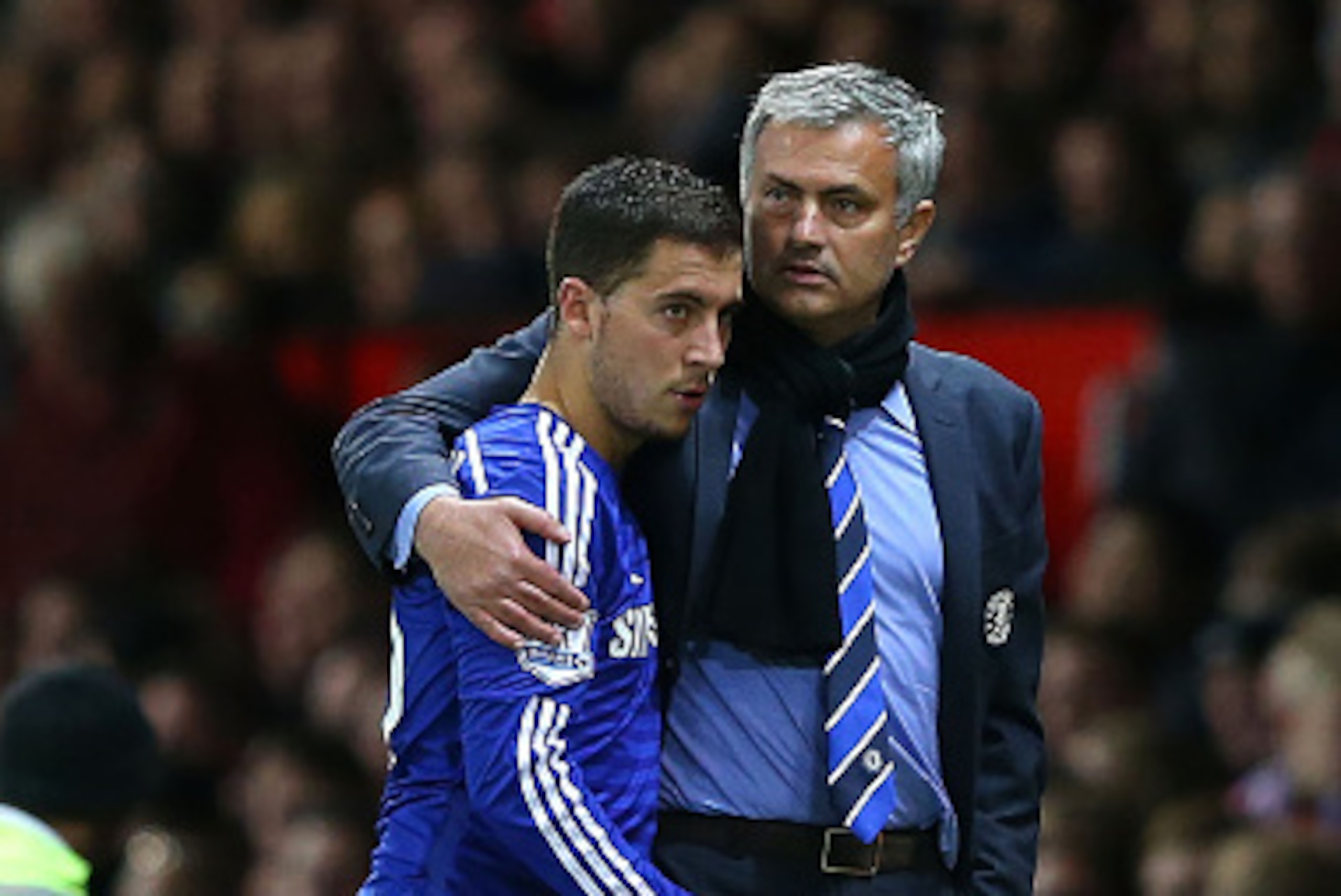 MANCHESTER, ENGLAND - OCTOBER 26:  Chelsea Manager Jose Mourinho embraces Eden Hazard during the Barclays Premier League match between Manchester United and Chelsea at Old Trafford on October 26, 2014 in Manchester, England.  (Photo by Alex Livesey/Getty 