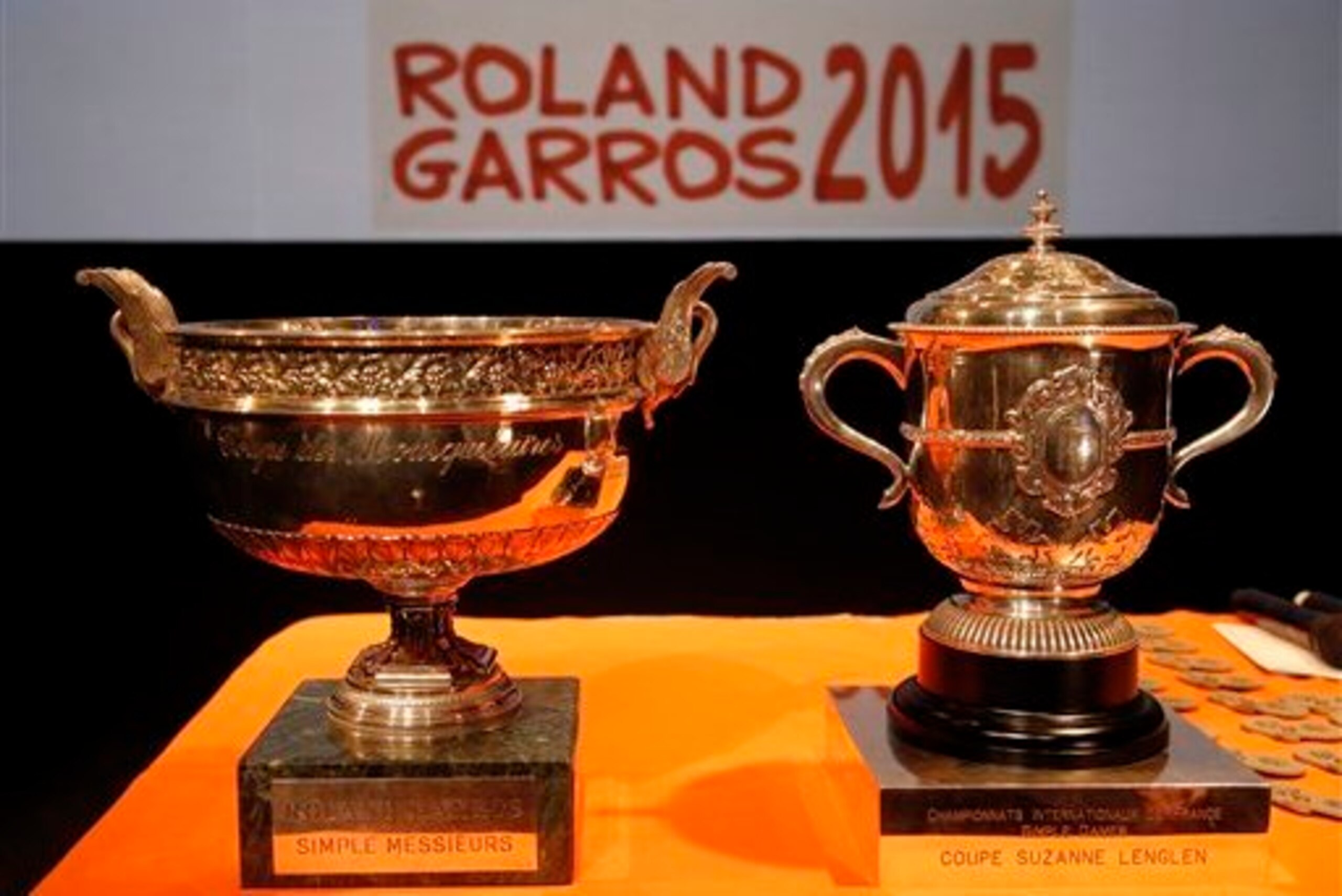 The men's and women's French Open trophies.