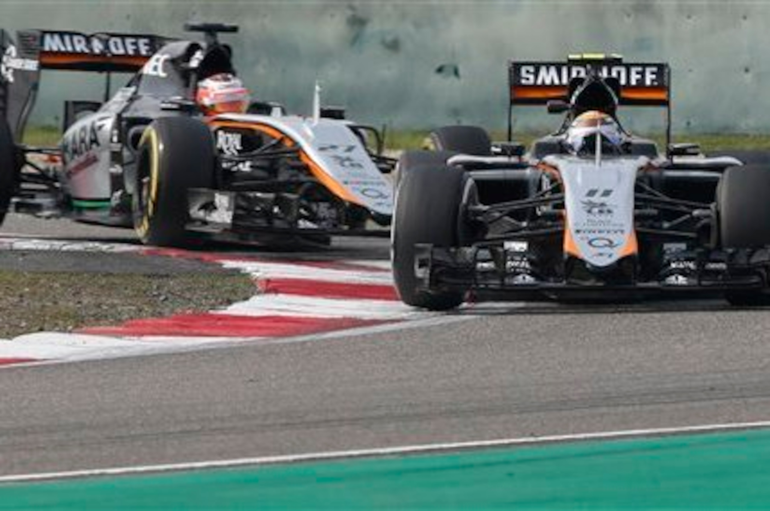 Sergio Perez and Nico Hulkenberg on track.