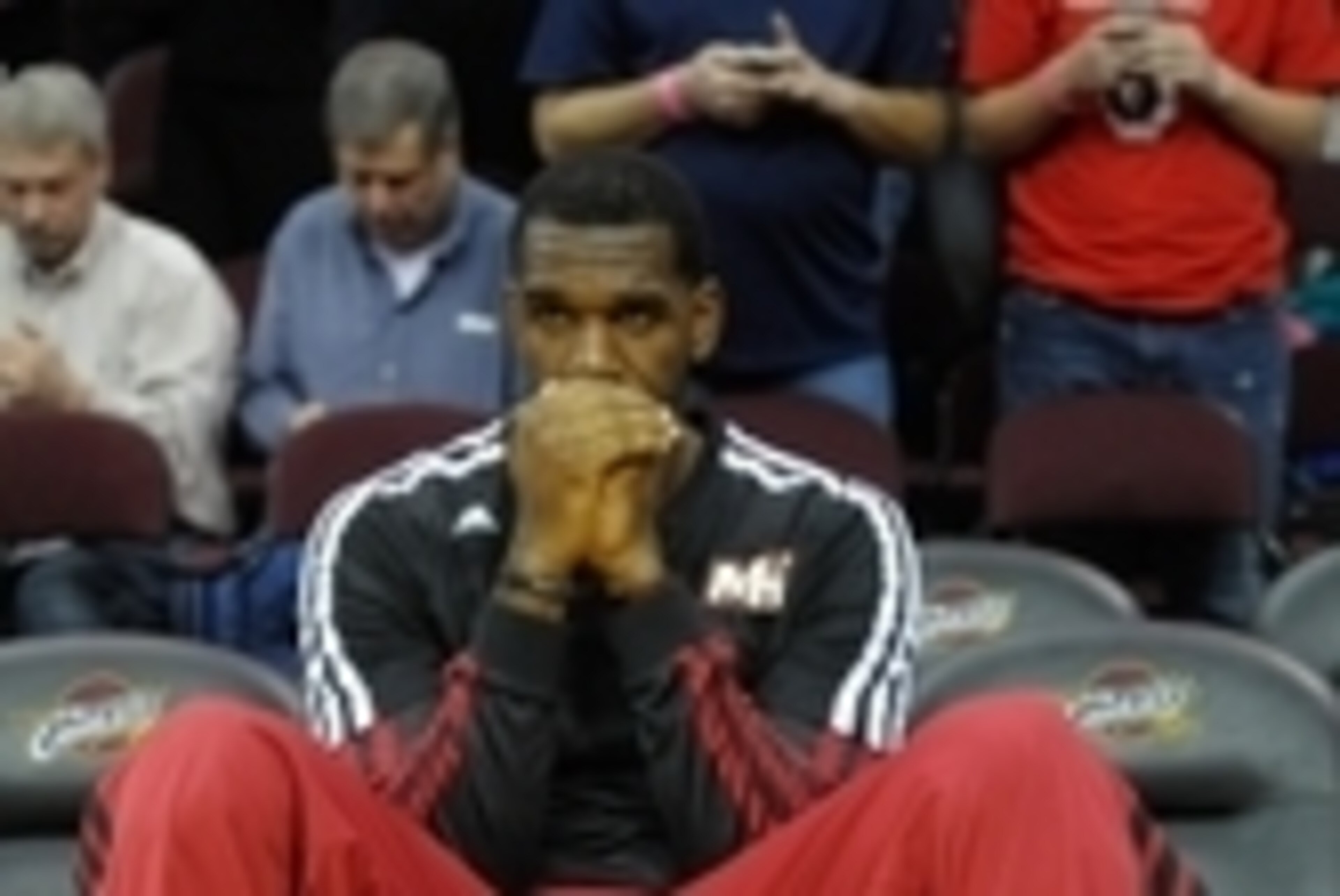 Mar 18, 2014; Cleveland, OH, USA; Miami Heat center Greg Oden (20) sits on the bench prior to a game against the Cleveland Cavaliers at Quicken Loans Arena. Miami won 100-96. Mandatory Credit: David Richard-USA TODAY Sports