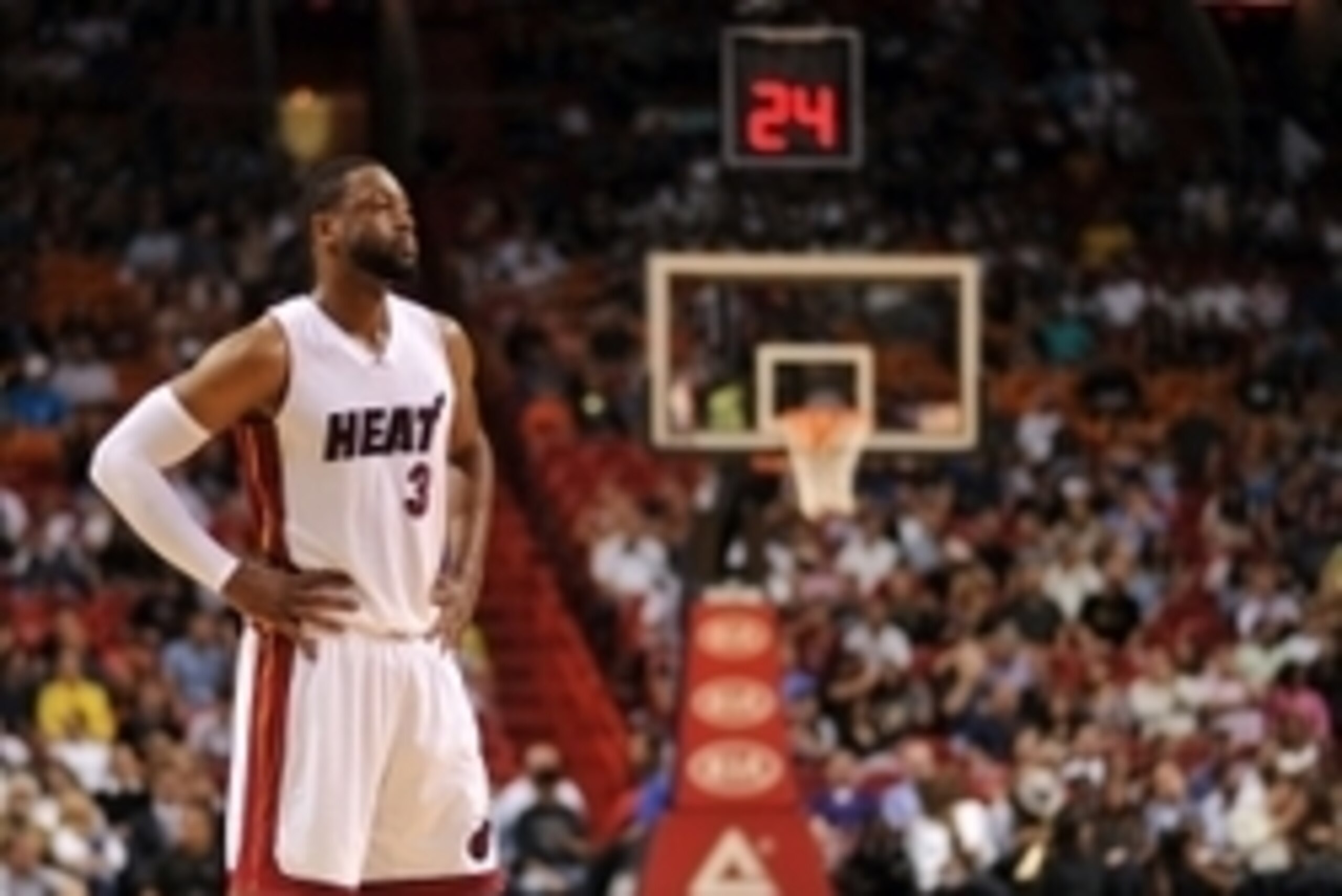 Apr 13, 2015; Miami, FL, USA; Miami Heat guard Dwyane Wade (3) takes a breather during the first half against the Orlando Magic at American Airlines Arena. Mandatory Credit: Steve Mitchell-USA TODAY Sports