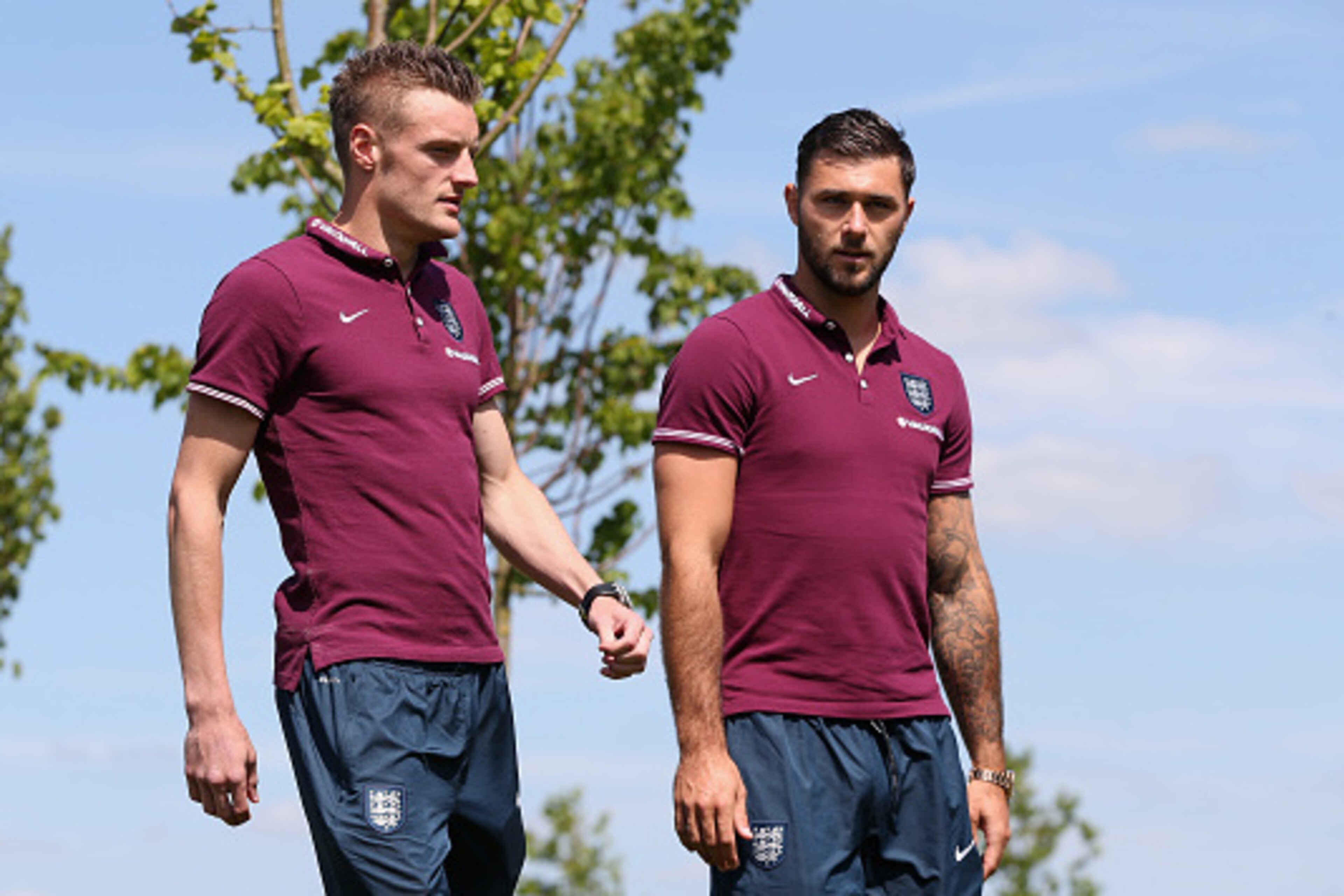 BURTON-UPON-TRENT, ENGLAND - JUNE 04:  Jamie Vardy (L) and Charlie Austin pose during the England press session held at St Georges Park on June 4, 2015 in Burton-upon-Trent, England.  (Photo by David Rogers/Getty Images)