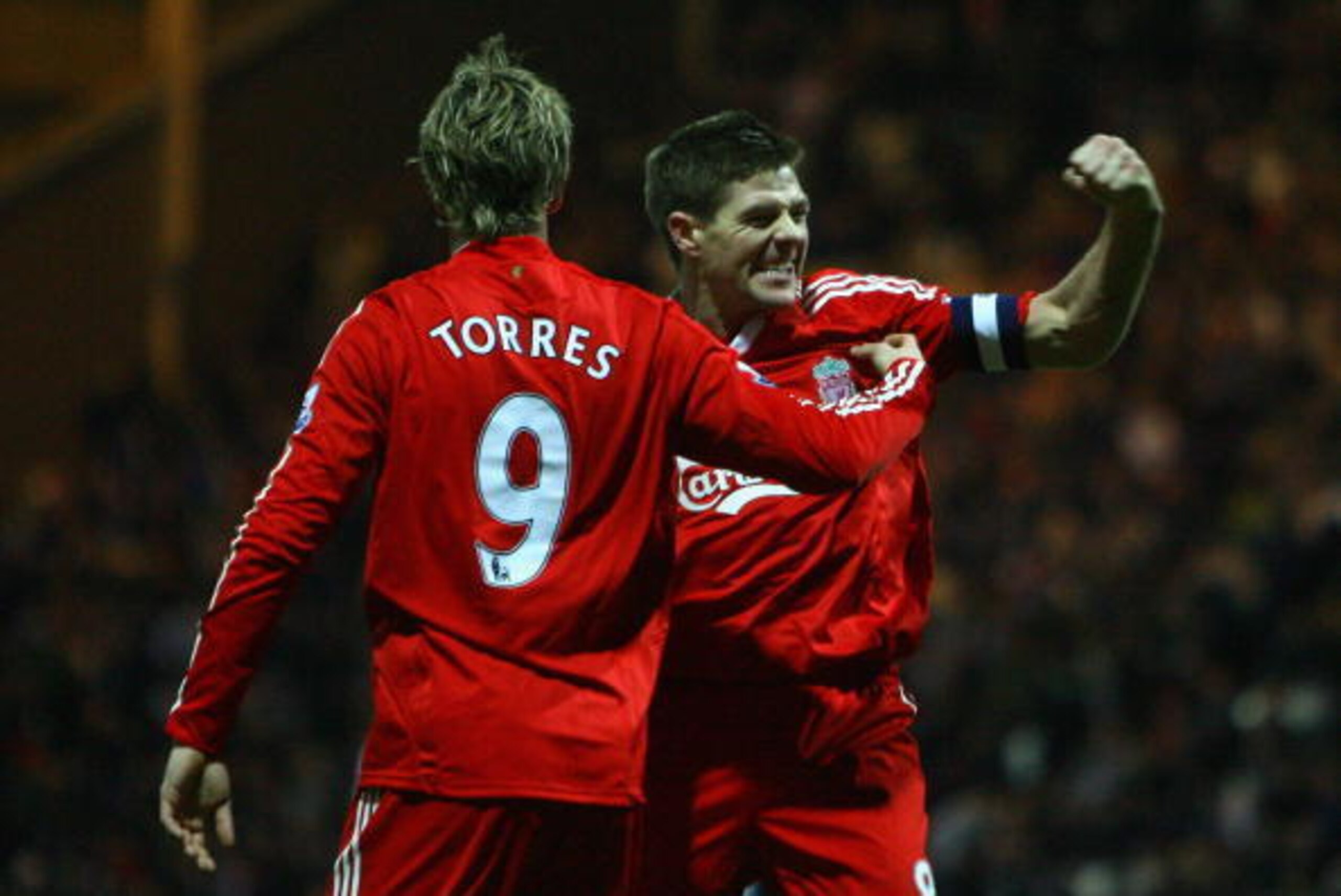 PRESTON, UNITED KINGDOM - JANUARY 03:  Fernando Torres celebrates with team mate Steven Gerrard of Liverpool after scoring his team's second goal during the FA Cup sponsored by E.ON Third Round match between Preston North End and Liverpool at Deepdale Sta
