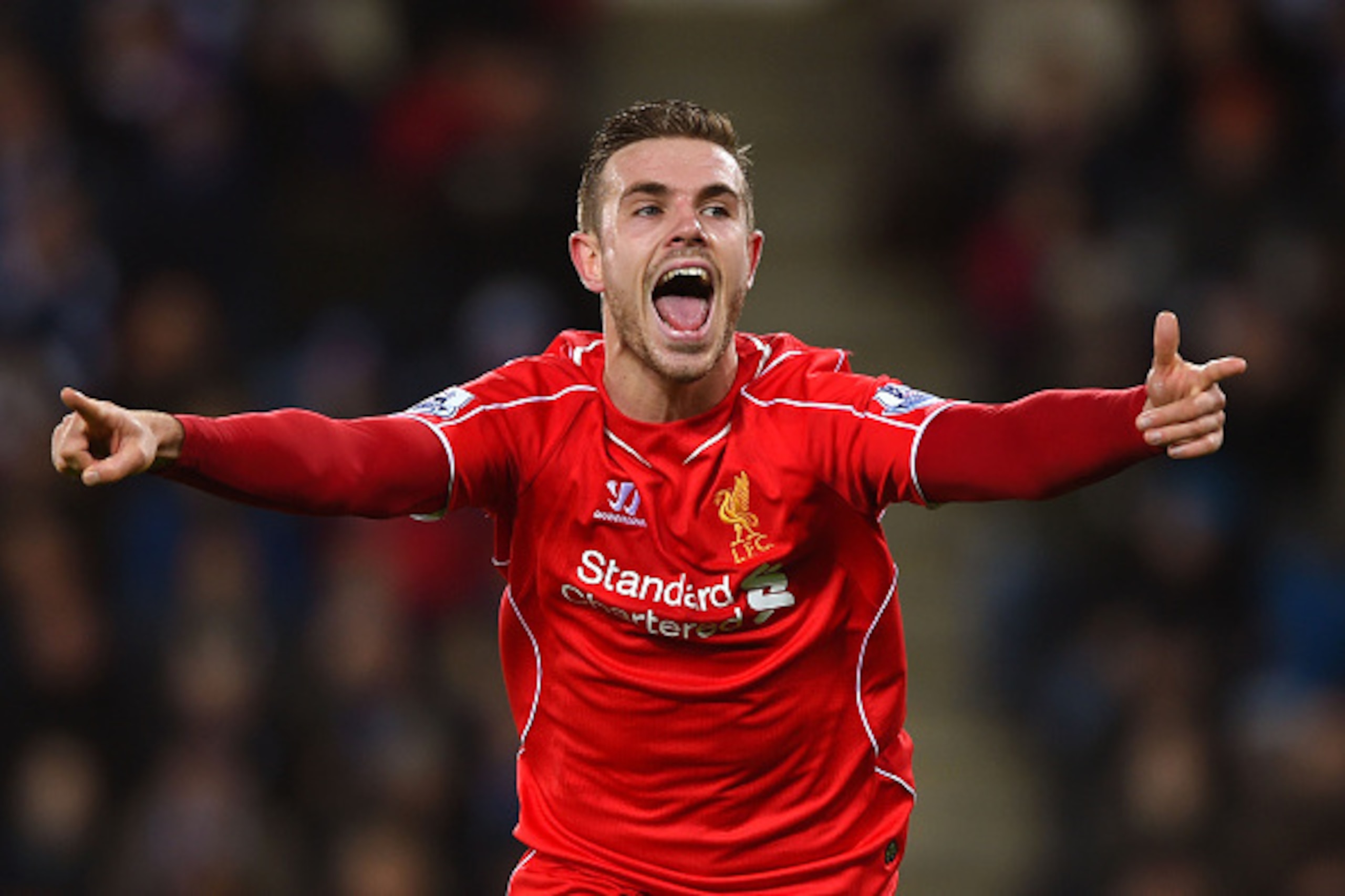 LEICESTER, ENGLAND - DECEMBER 02:  Jordan Henderson of Liverpool celebrates after scoring his team's third goal during the Barclays Premier League match between Leicester City and Liverpool at The King Power Stadium on December 2, 2014 in Leicester, Engla