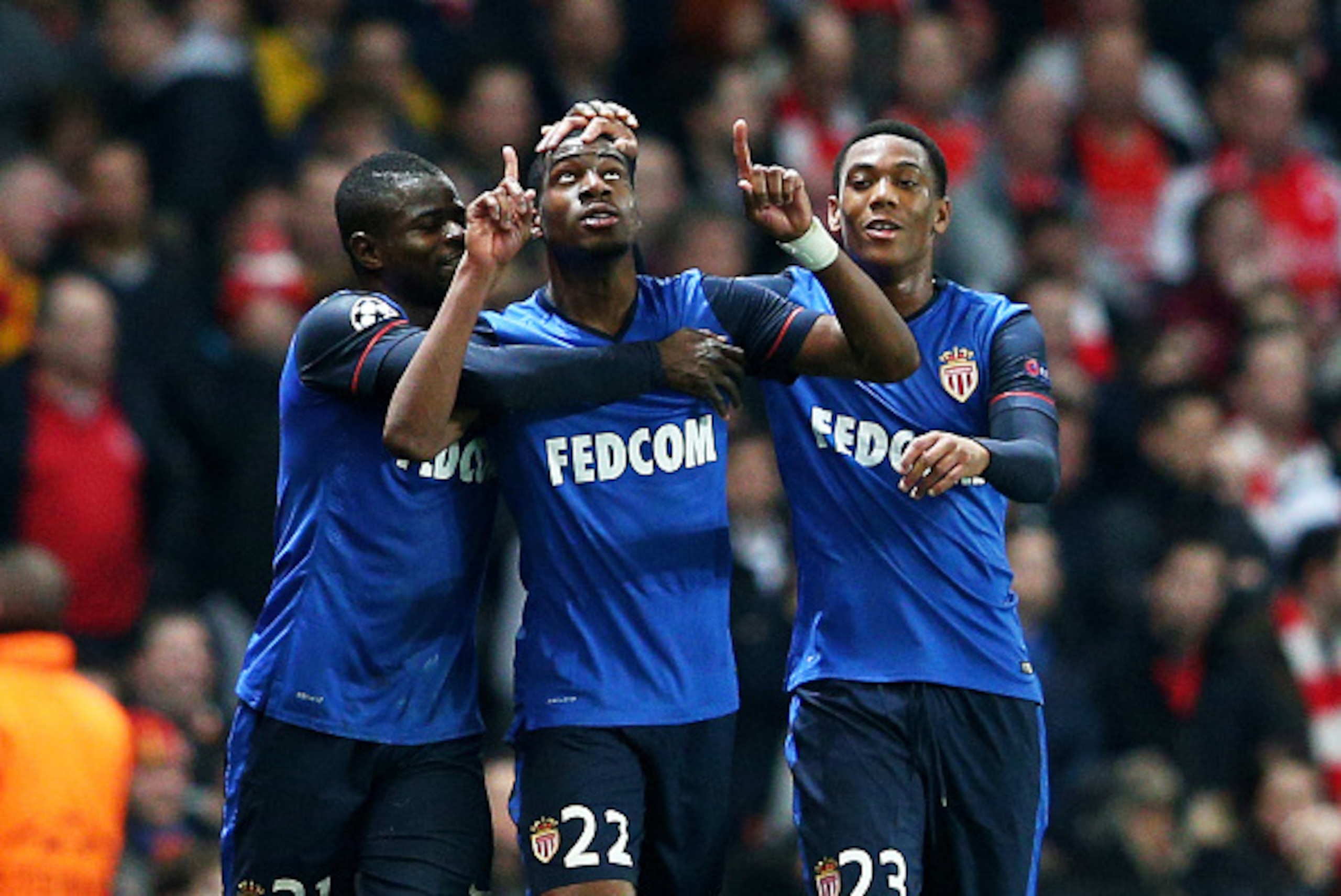 LONDON, ENGLAND - FEBRUARY 25:  Geoffrey  Kondogbia #22 (C) of Monaco celebates with teammates after scoring the opening goal during the UEFA Champions League round of 16, first leg match between Arsenal and Monaco at The Emirates Stadium on February 25, 