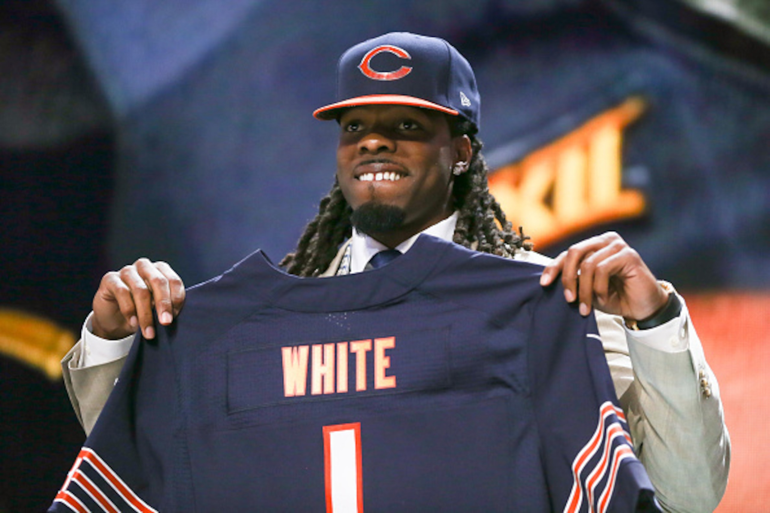 CHICAGO, IL - APRIL 30: Kevin White of the West Virginia Mountaineers holds up a jersey after being chosen #7 overall by the Chicago Bears during the first round of the 2015 NFL Draft at the Auditorium Theatre of Roosevelt University on April 30, 2015 in CHICAGO, IL - APRIL 30: Kevin White of the West Virginia Mountaineers holds up a jersey after being chosen #7 overall by the Chicago Bears during the first round of the 2015 NFL Draft at the Auditorium Theatre of Roosevelt University on April 30, 2015 in